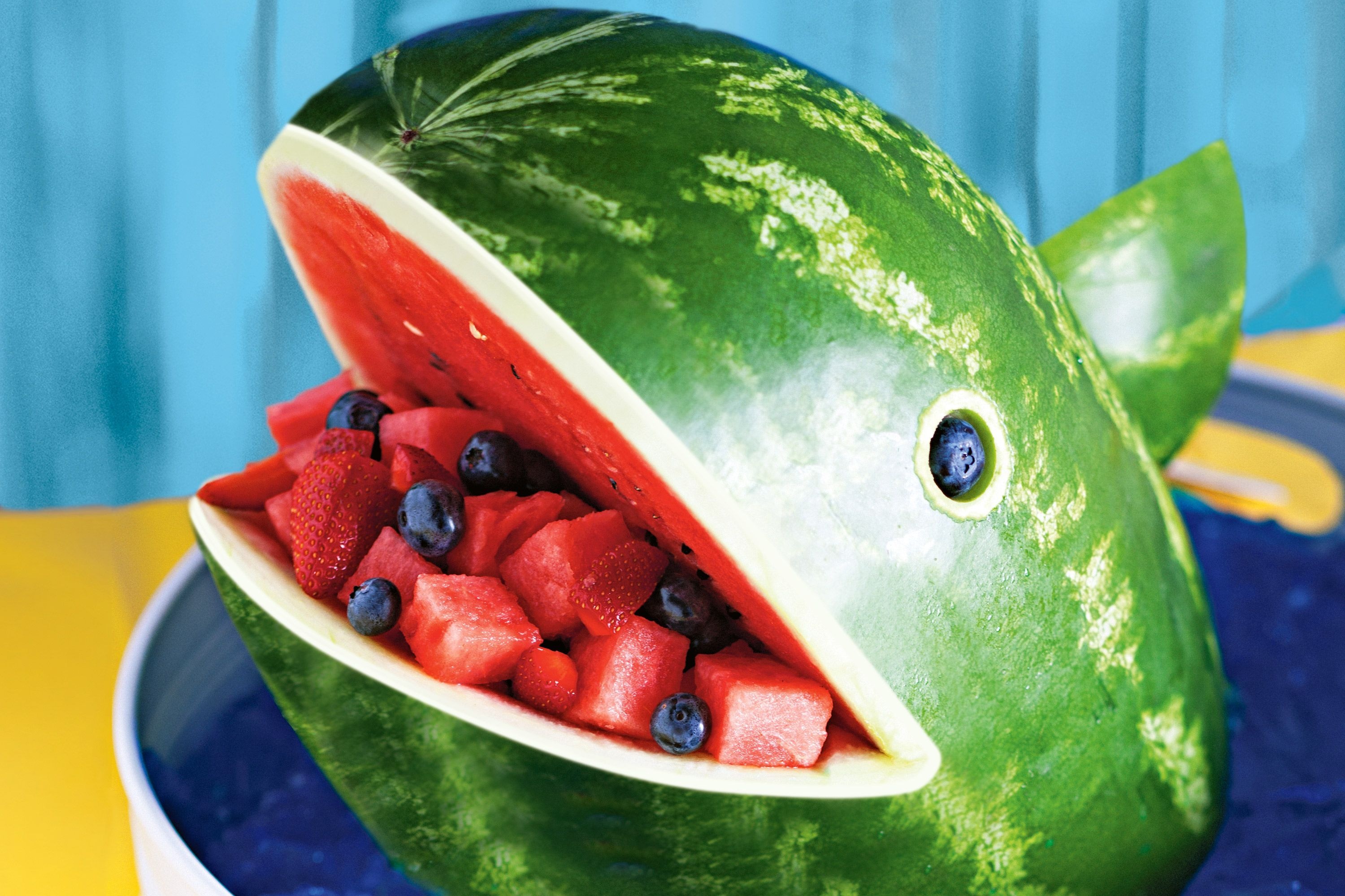 Watermelon: A sweet, commonly consumed fruit of summer, usually as fresh slices, diced in mixed fruit salads, or as juice. 3000x2000 HD Background.
