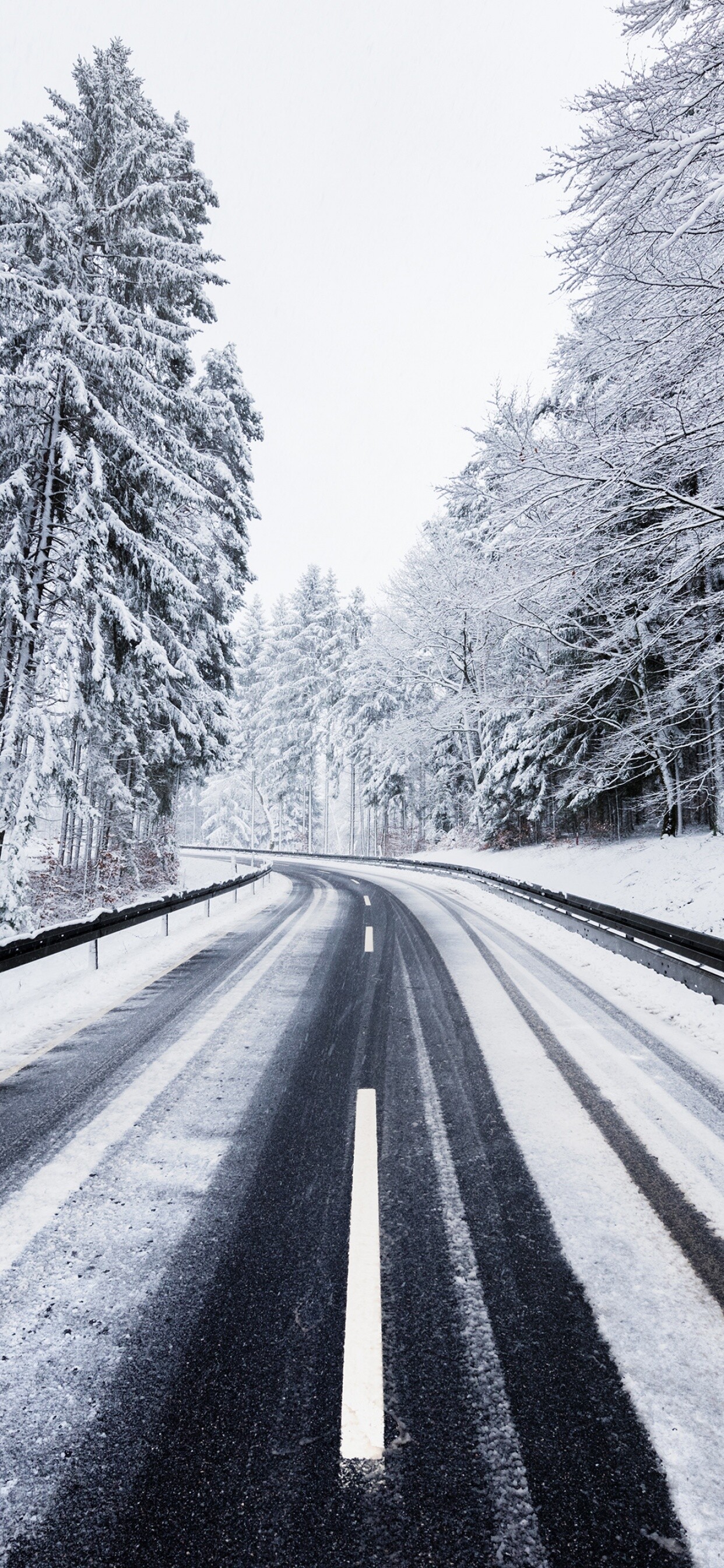 Winter: A snowy road, Icy-cold, Snow-generating weather events. 1250x2690 HD Wallpaper.