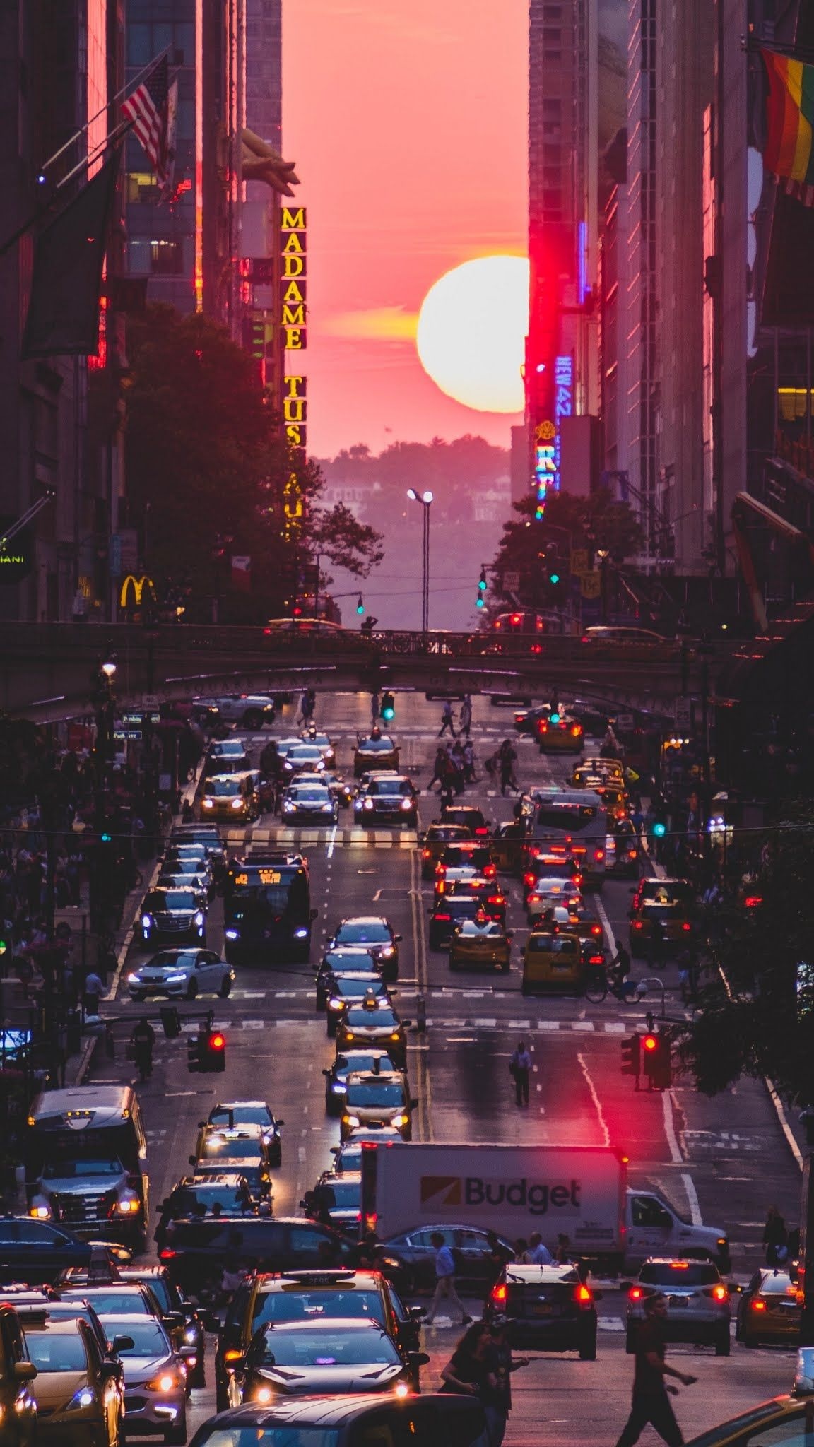 Skyline: Amazing sunset in New York, 42nd Street, Manhattan, Madame Tussauds. 1160x2050 HD Wallpaper.
