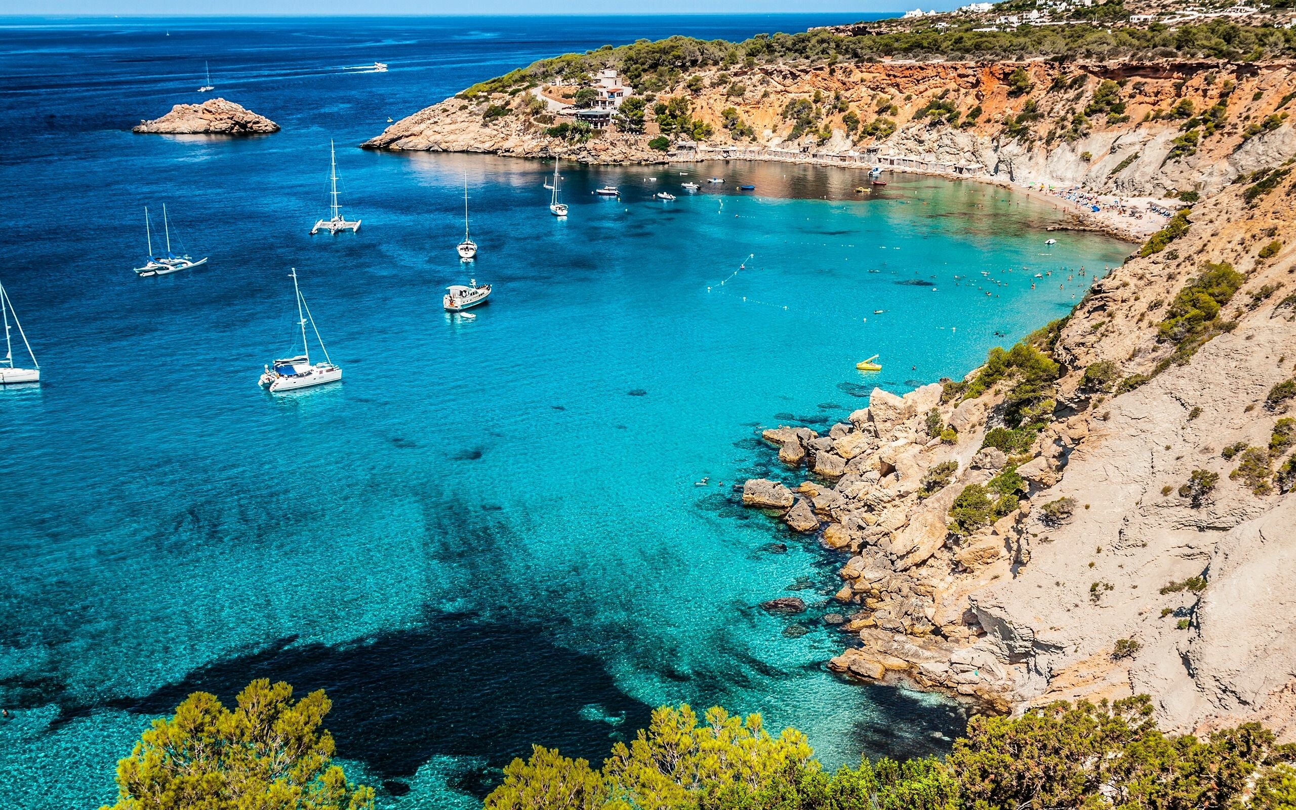Ibiza: A rock island covering an area of 572.56 square kilometers. 2560x1600 HD Wallpaper.