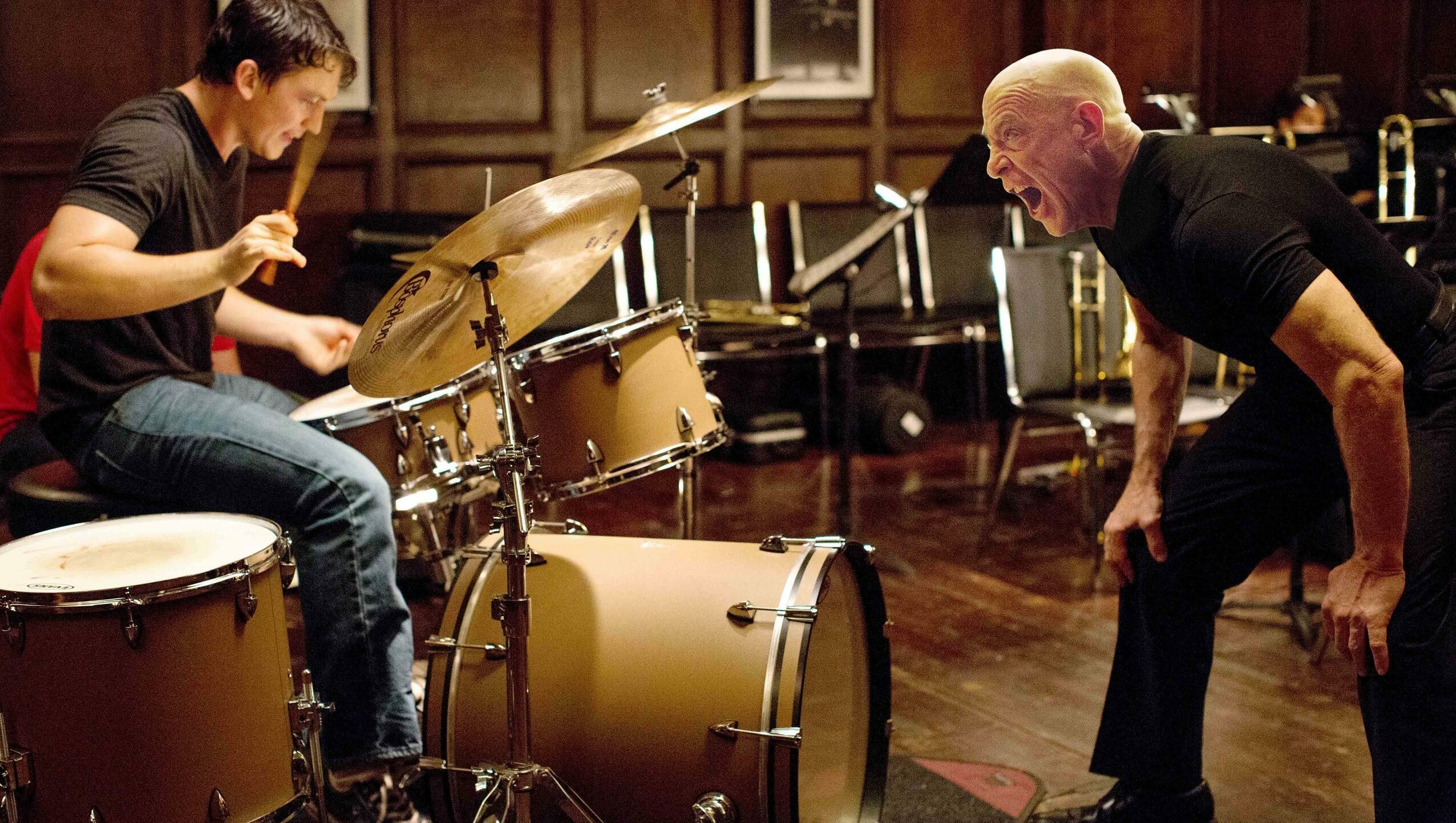 Whiplash: Jazz drummer Andrew Neiman, who is pushed to his limit by his abusive instructor Terence Fletcher. 2560x1450 HD Wallpaper.
