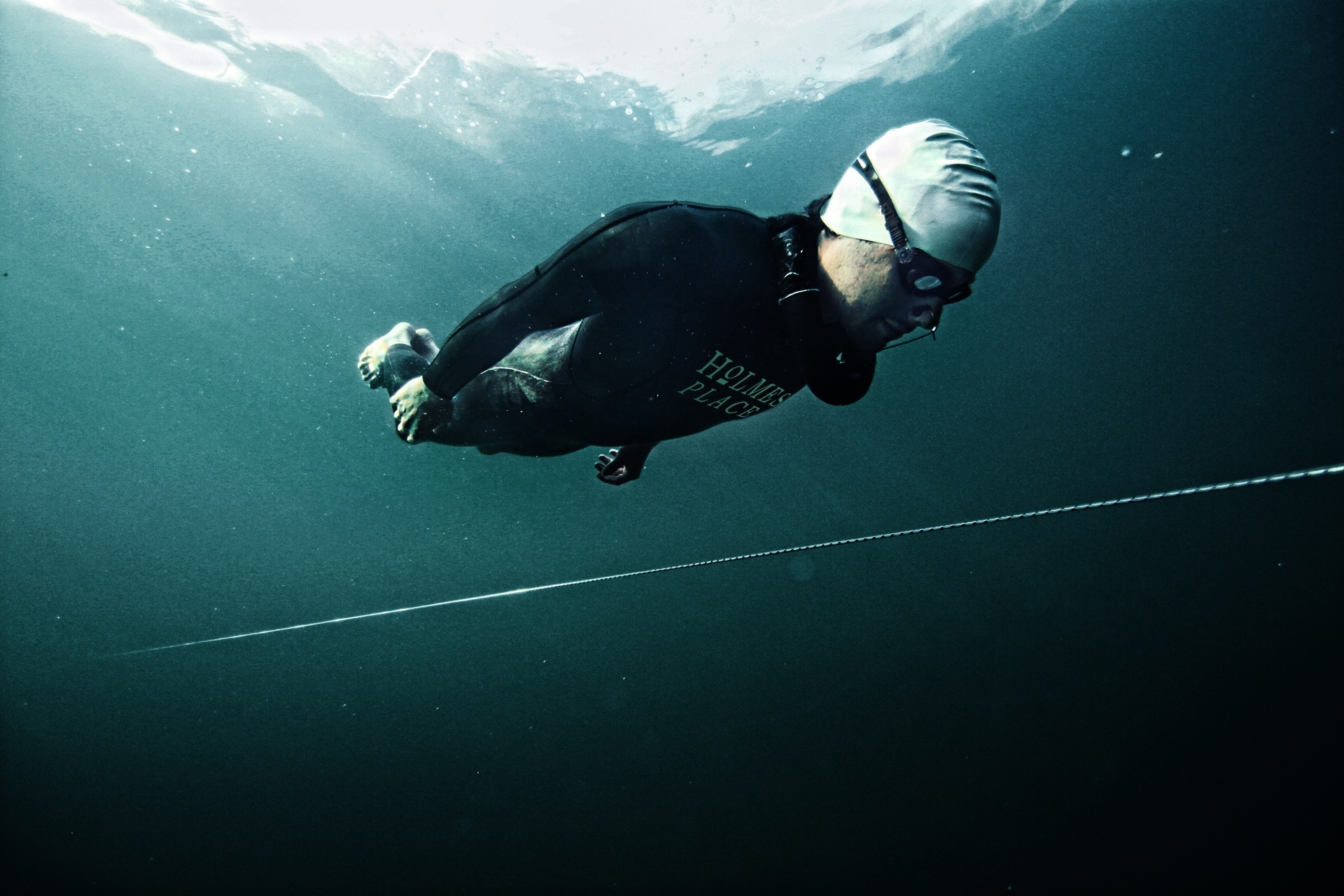 Freediving: A freediver during his underwater training session with a navigation rope. 1920x1280 HD Wallpaper.