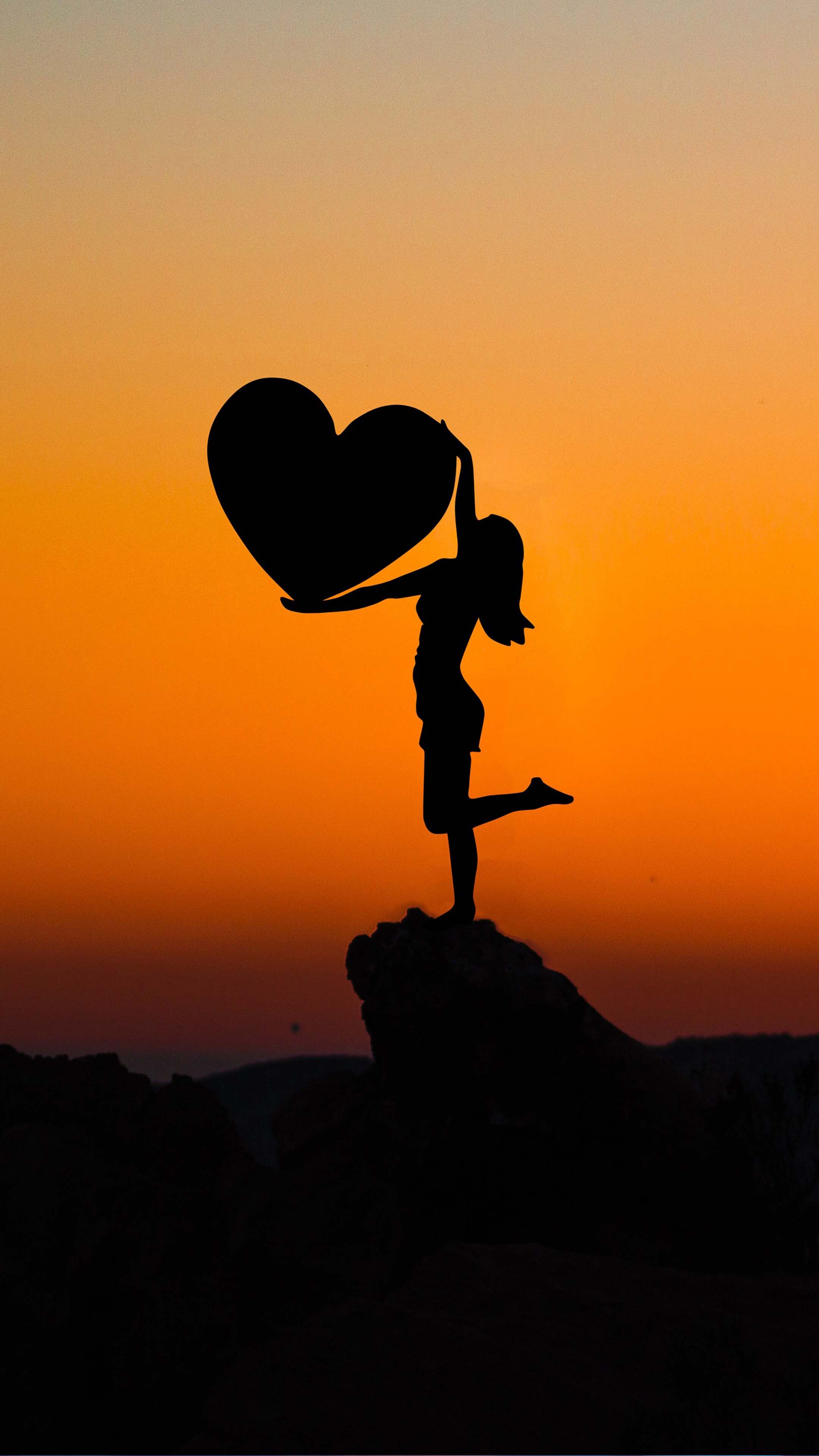 Girly: Sunset, Romantic, Silhouette, The girl standing on the rock, Heart. 2160x3840 4K Wallpaper.