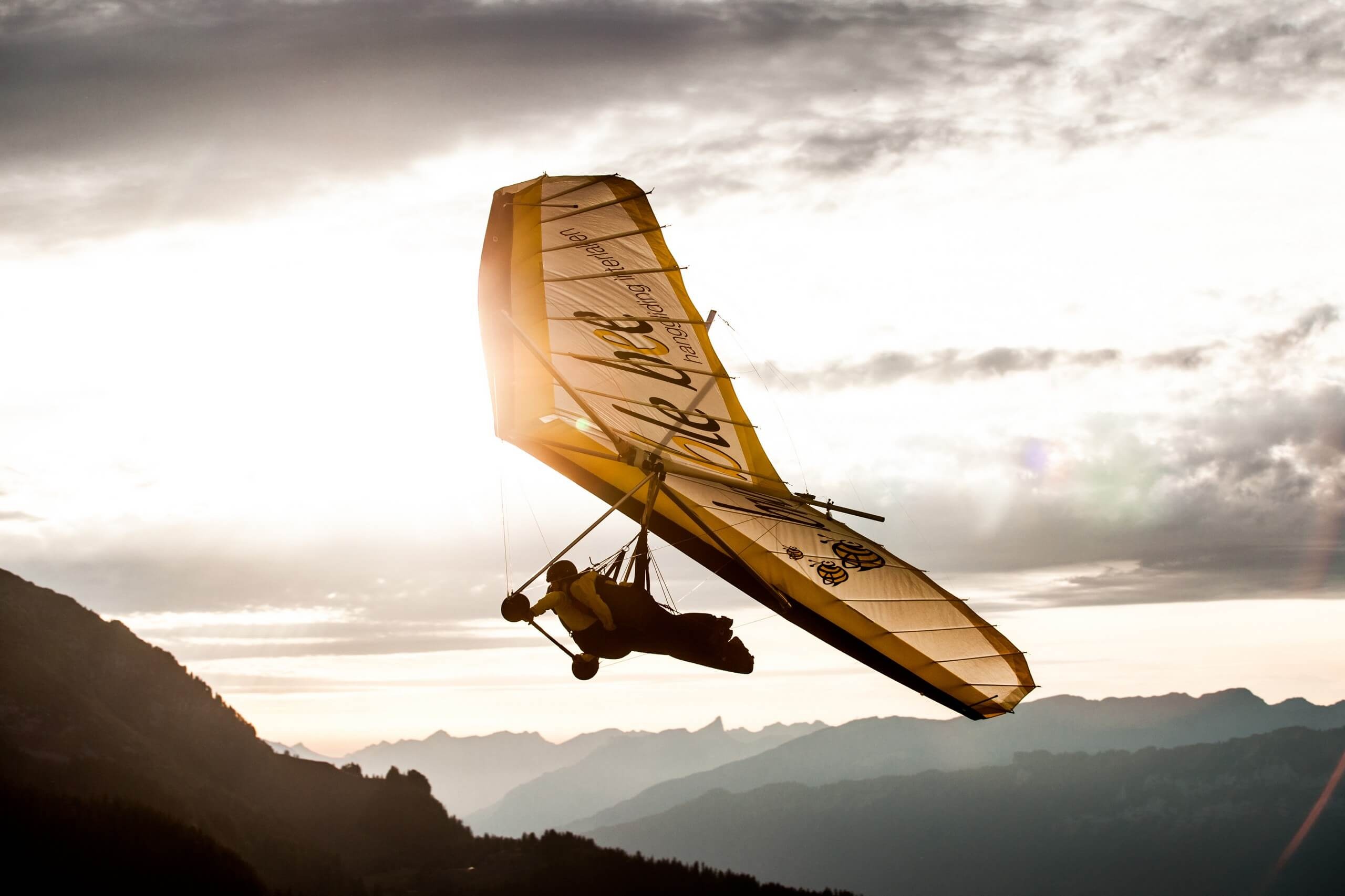 Gliding: Bumble Bee Hang Gliding in Interlaken, Switzerland. 2560x1710 HD Wallpaper.