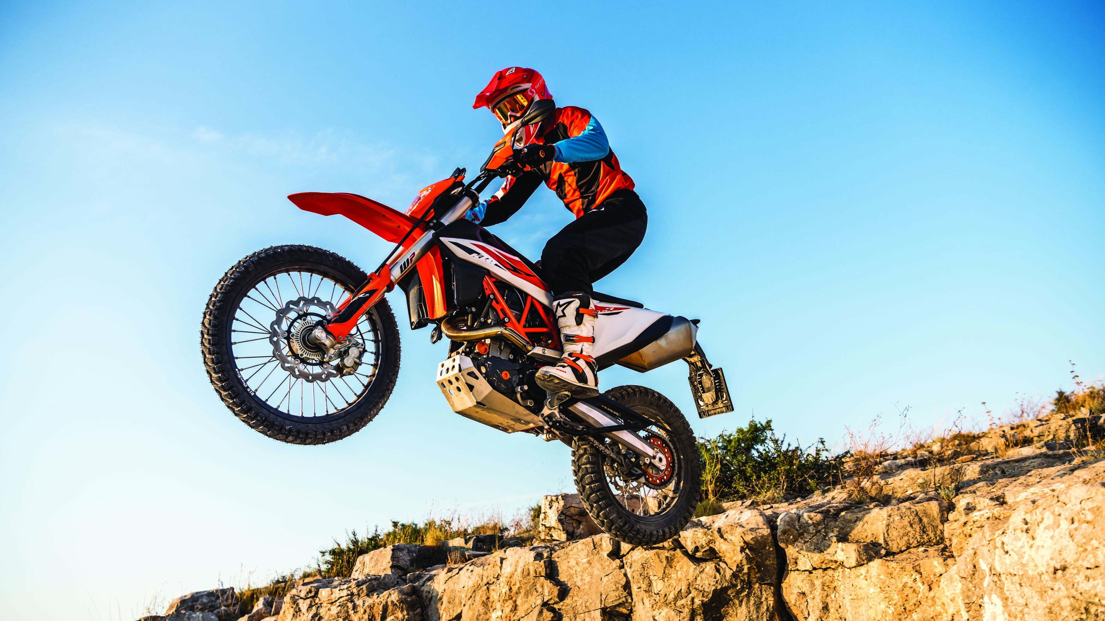Enduro Motorbike: Extreme Sports, Specialized Tires, Reinforced Tread, Stunt Jumping, Dirt Bike Rider. 3840x2160 4K Background.