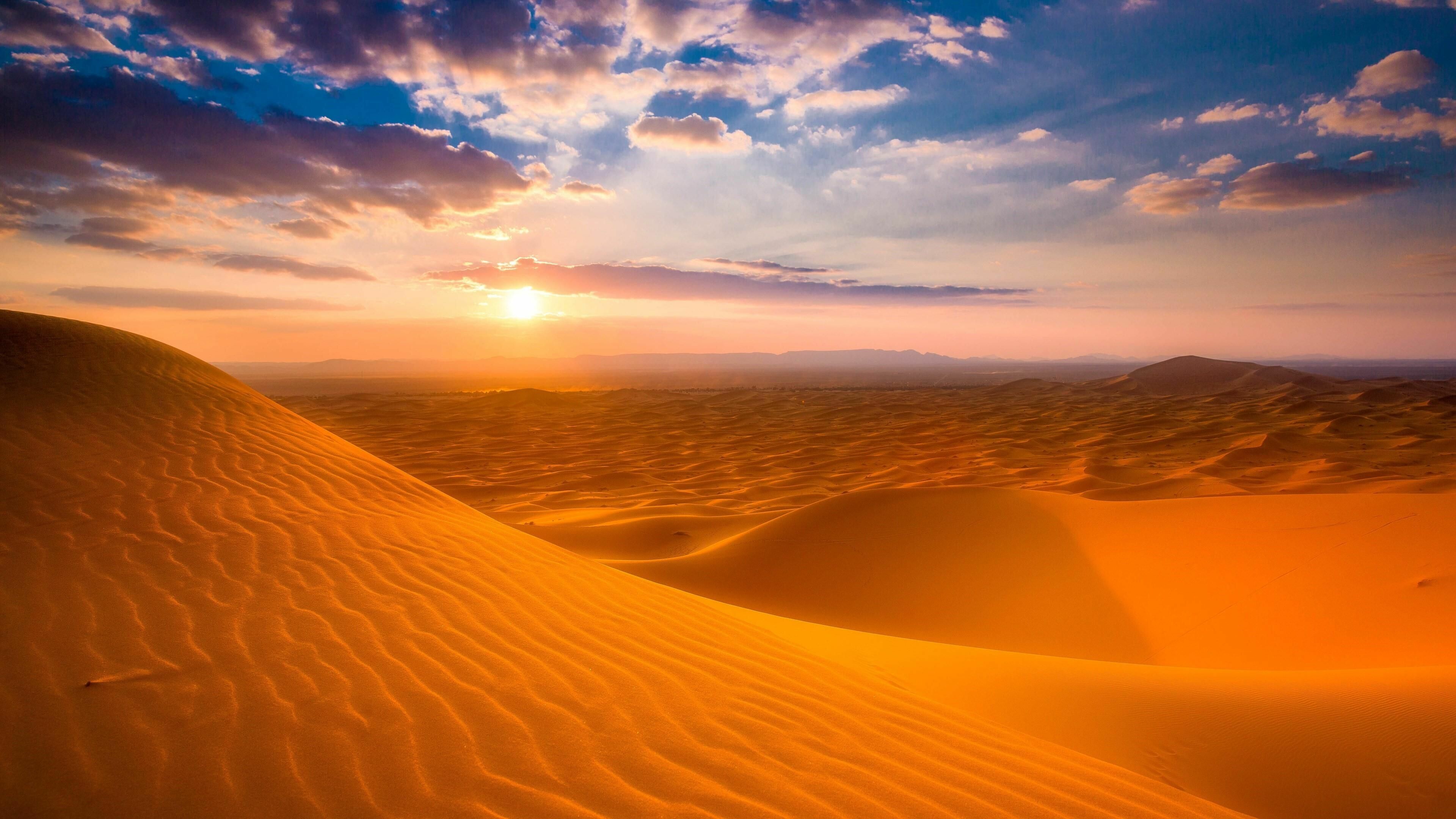 Desert: A barren area of landscape where little precipitation occurs and, consequently, living conditions are hostile for plant and animal life. 3840x2160 4K Wallpaper.