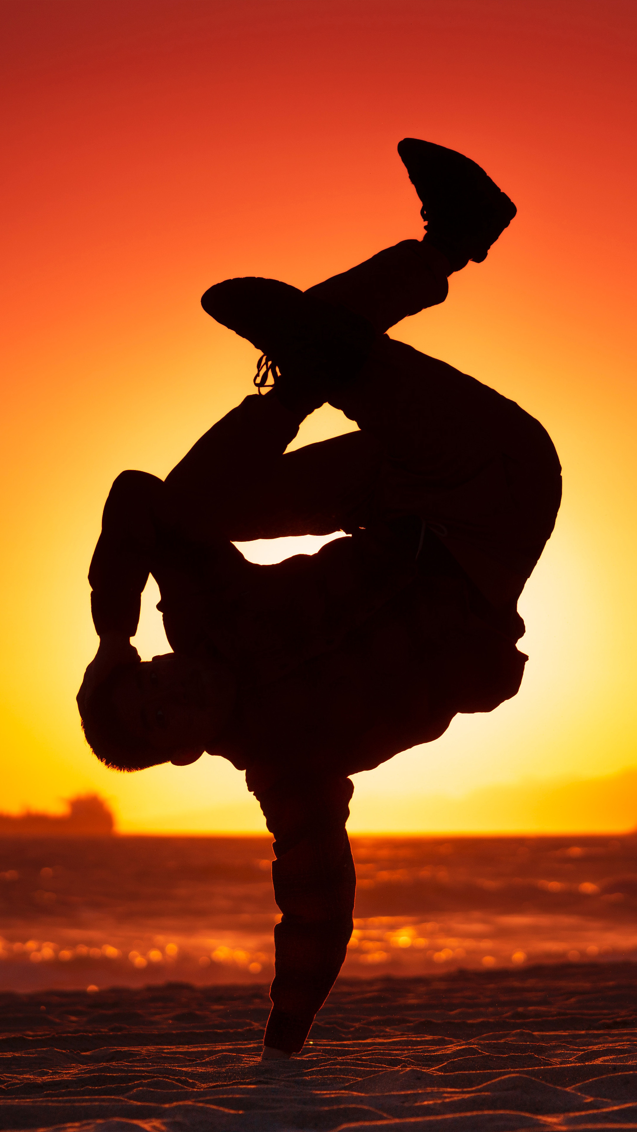Boy dancing silhouette, Beach sunset atmosphere, Sunlight illuminating, 4K mobile wallpaper, 2160x3840 4K Handy