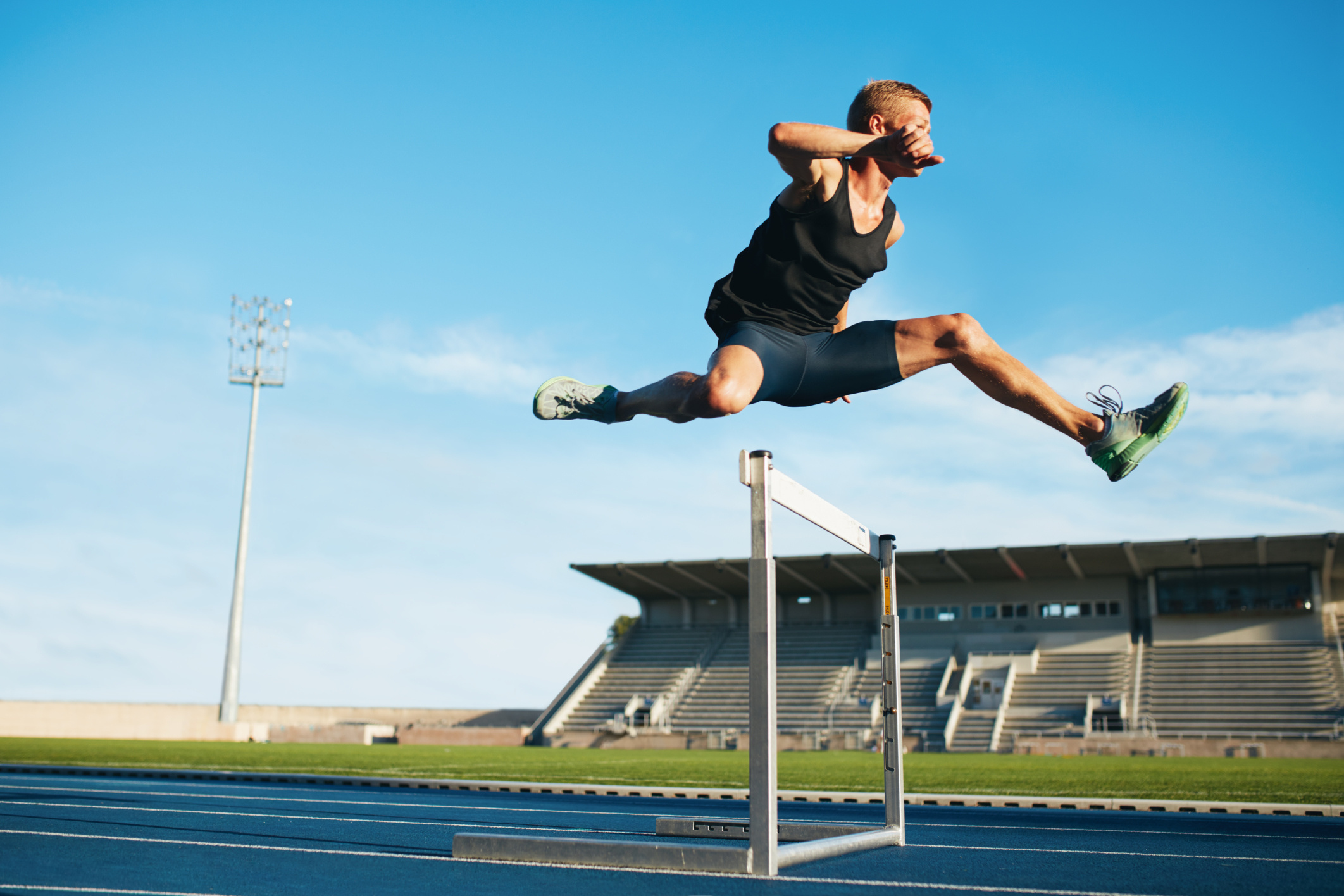 Jumping: Hurdling, Racing over hurdles, Running over an obstacle in a sprint. 2130x1420 HD Background.