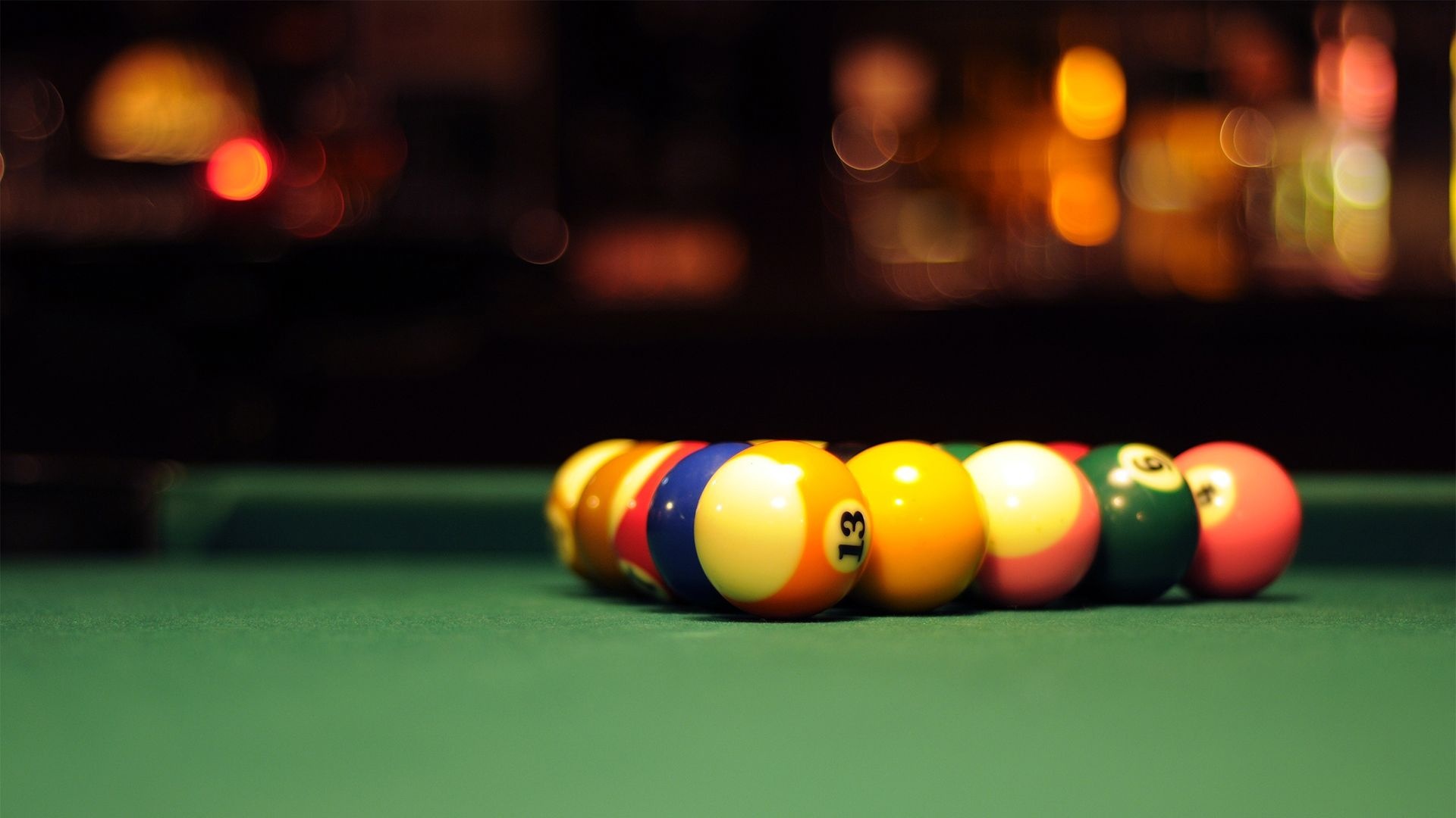 Pool (Cue Sports): Fifteen object balls - small solid numbered balls used in a classic American eight-ball game. 1920x1080 Full HD Background.
