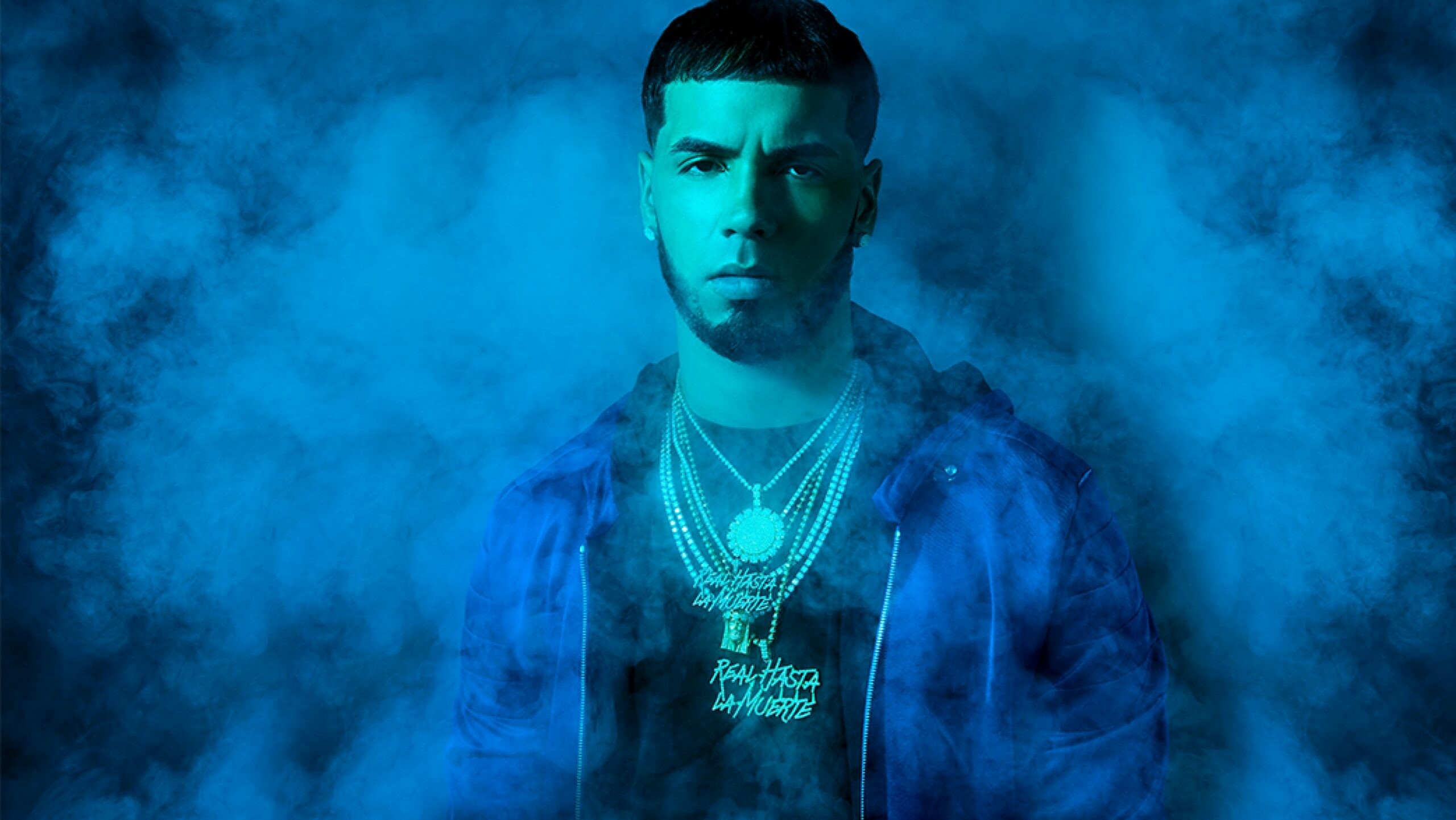 Anuel AA: A controversial figure in the Latin music scene for his legal troubles. 2560x1450 HD Background.