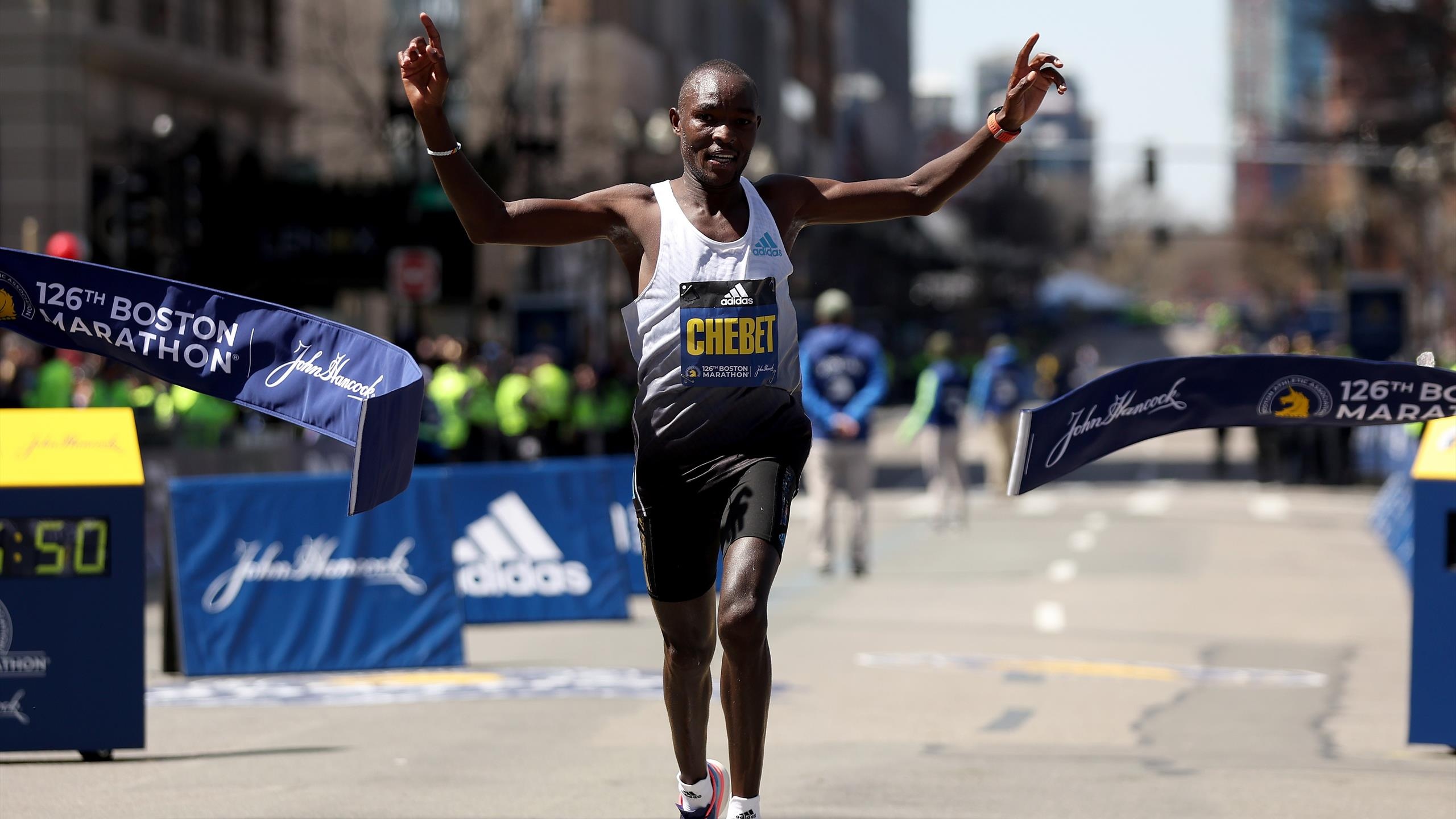 Marathon: Evans Chebet's triumph, 126th Boston Marathon, A long-distance running event, Peres Jepchirchir's competitor. 2560x1440 HD Background.