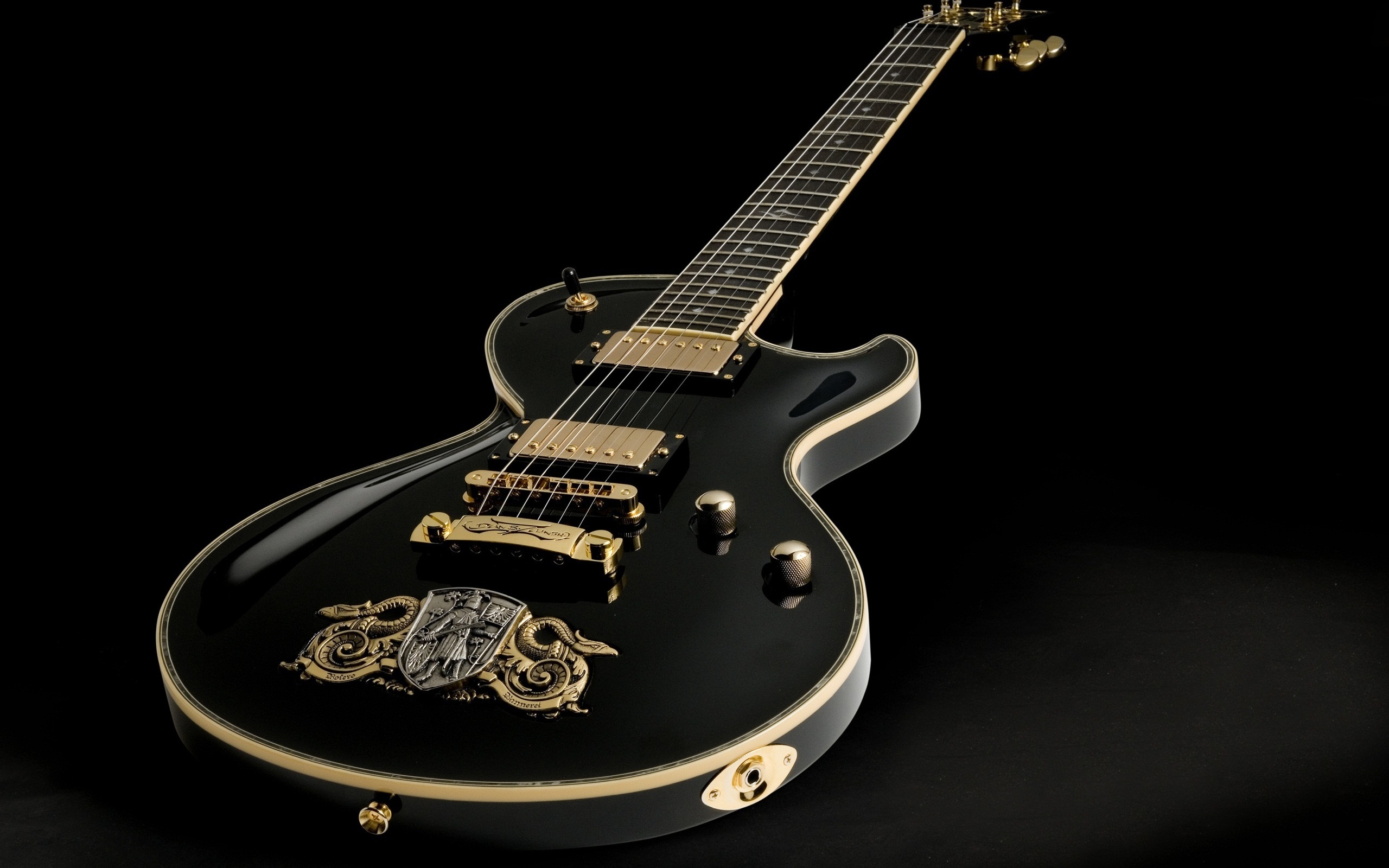 Guitar: DBZ Diamond Bolero Calavera, Black Gloss Electric Guitar, A Plucked Stringed Instrument Originating in Spain. 2560x1600 HD Background.