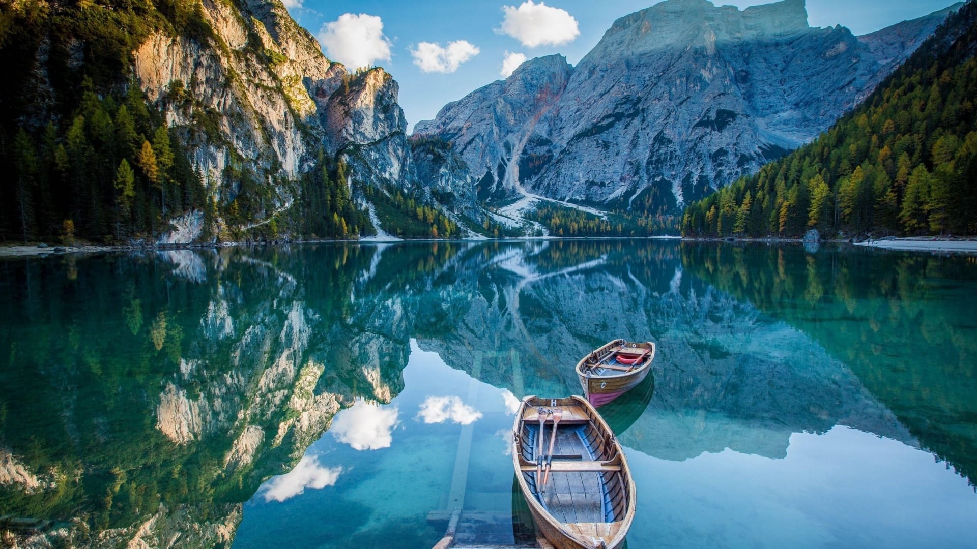 Landscape: Lake Braies, The Pragser Wildsee, Amazing water reserve in the Dolomites, Italy. 1920x1080 Full HD Background.