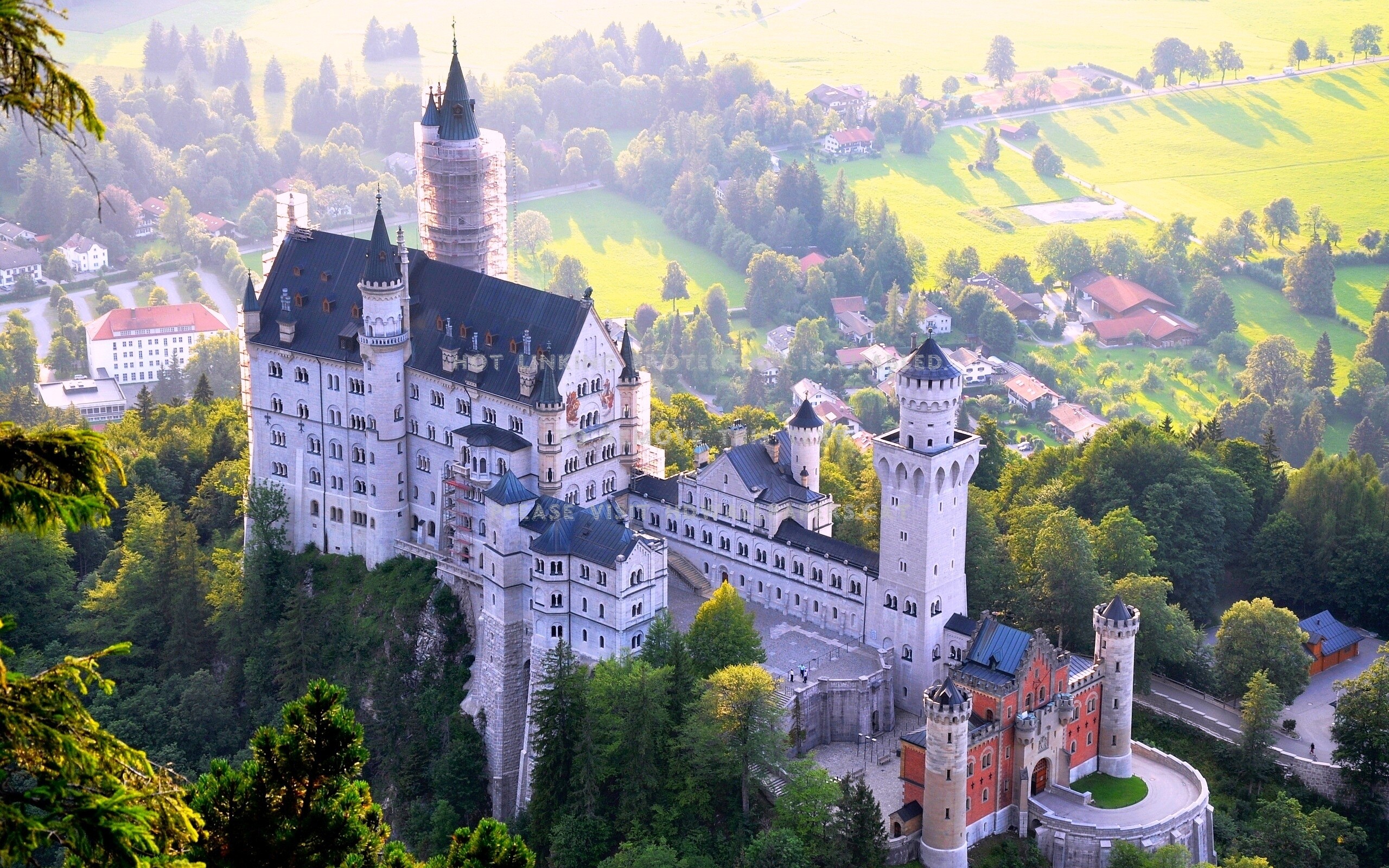 Neuschwanstein Castle: The palace of a famous Bavarian king, Aerial view. 2560x1600 HD Wallpaper.