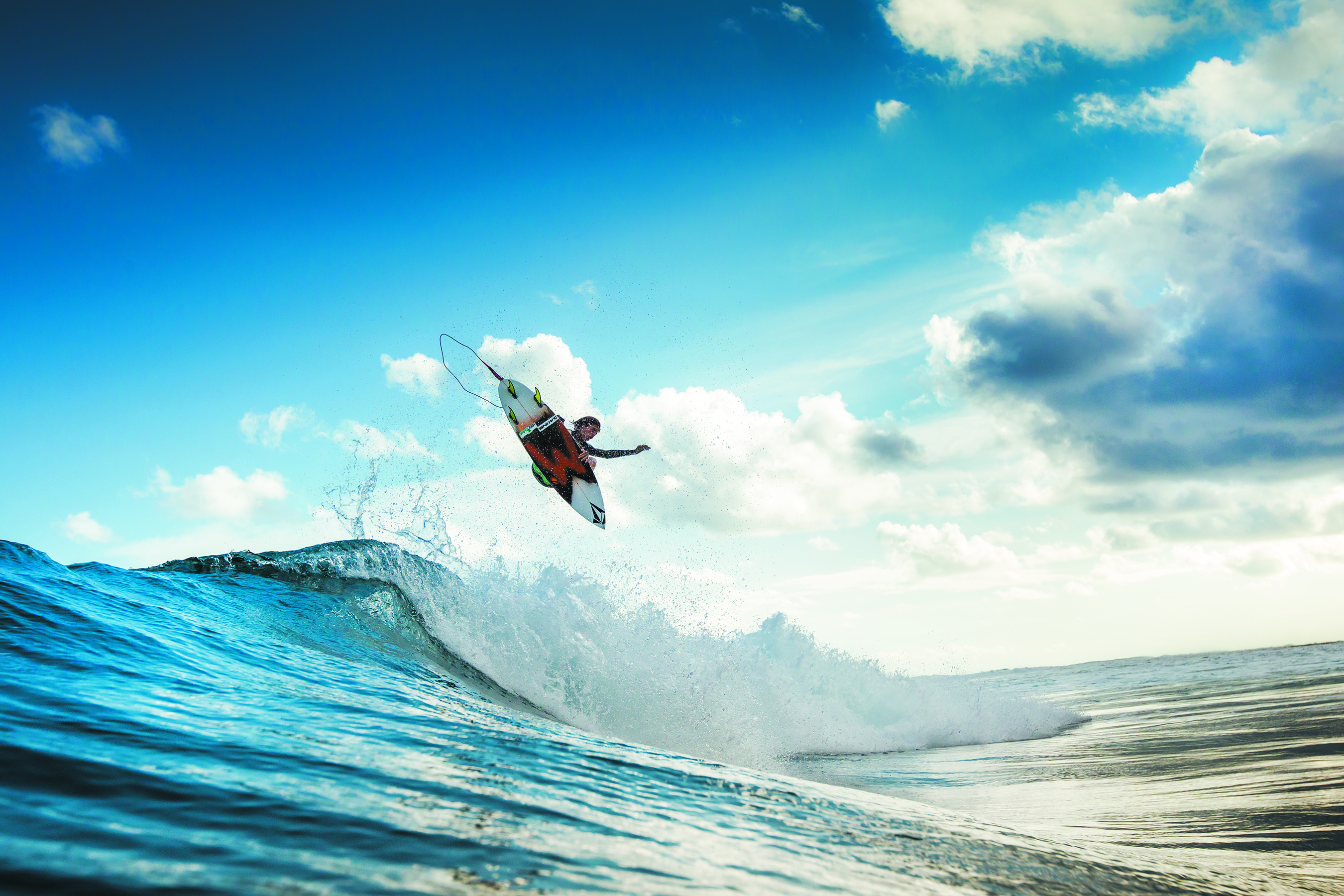 Surfing: Short boarding aerial tricks performance, Competitive water sports. 2700x1800 HD Wallpaper.