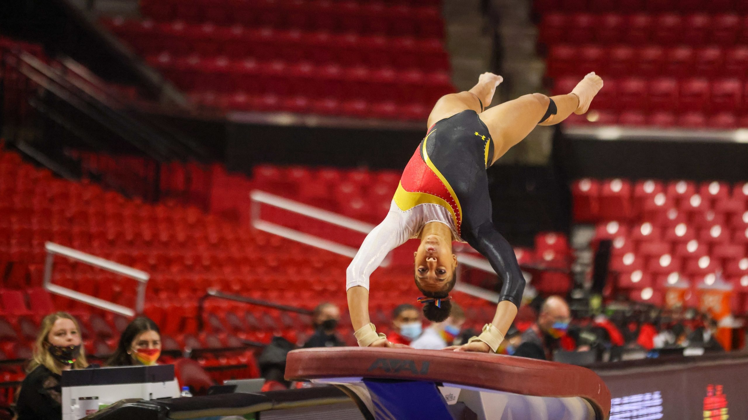 Vault (Gymnastics): Audrey Barber, Maryland vs. Michigan, Competitive team event. 2560x1440 HD Background.