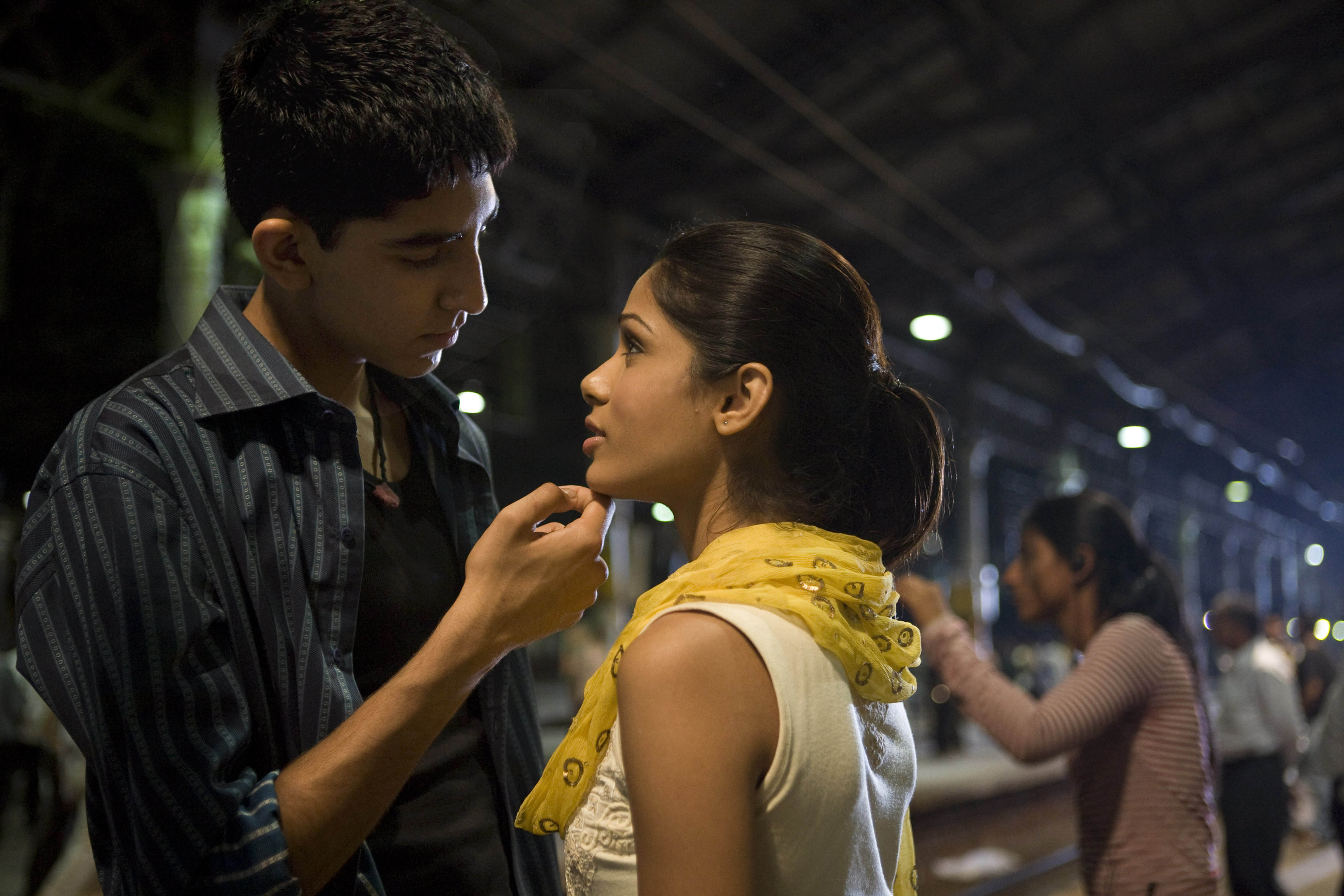 Slumdog Millionaire: Dev Patel as Jamal Malik and Freida Pinto as Latika. 3000x2000 HD Wallpaper.
