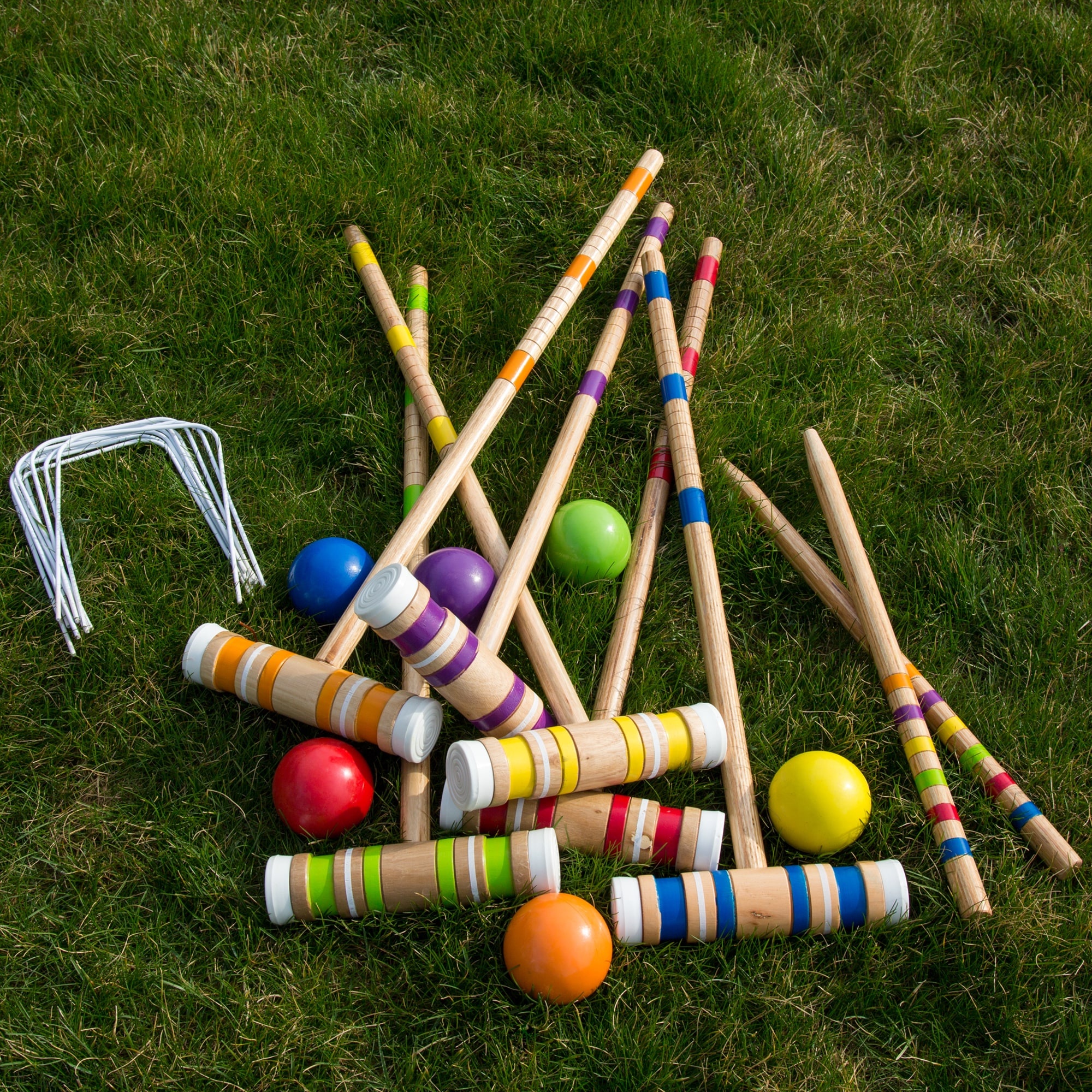 Croquet: Complete Game Set, 6 clubs and 6 balls of different colors with 6 hoops. 2000x2000 HD Background.