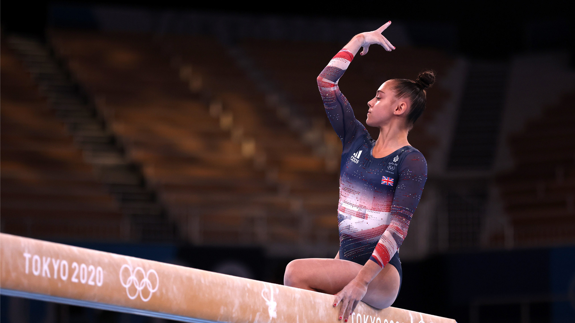 Balance Beam: Jessica Gadirova, The 2020 Tokyo Summer Olympics artistic gymnastics team event bronze medalist. 1920x1080 Full HD Background.