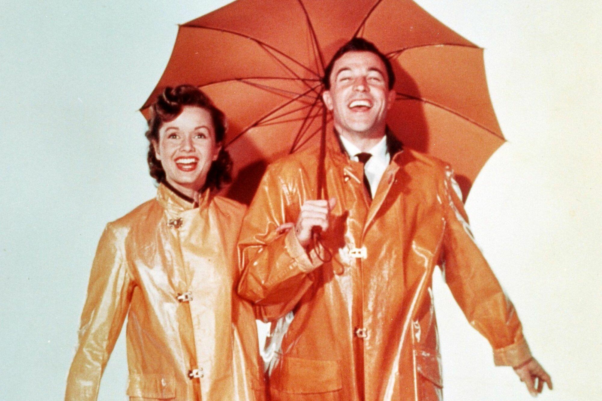 Singin' in the Rain: Donald (Don) Lockwood and Kathy Selden, American musical comedy film. 2000x1340 HD Background.