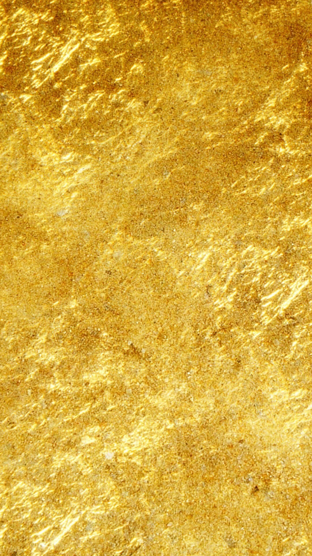 Gold Foil: The surface covered with thin golden sheets layered on using a gilder's tip. 1080x1920 Full HD Background.
