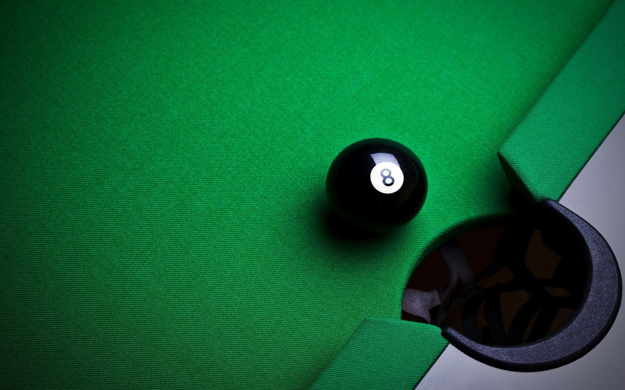 Pool (Cue Sports): The solid black billiard ball near the drop pocket, The symbol of the eight-ball style game. 2560x1600 HD Background.