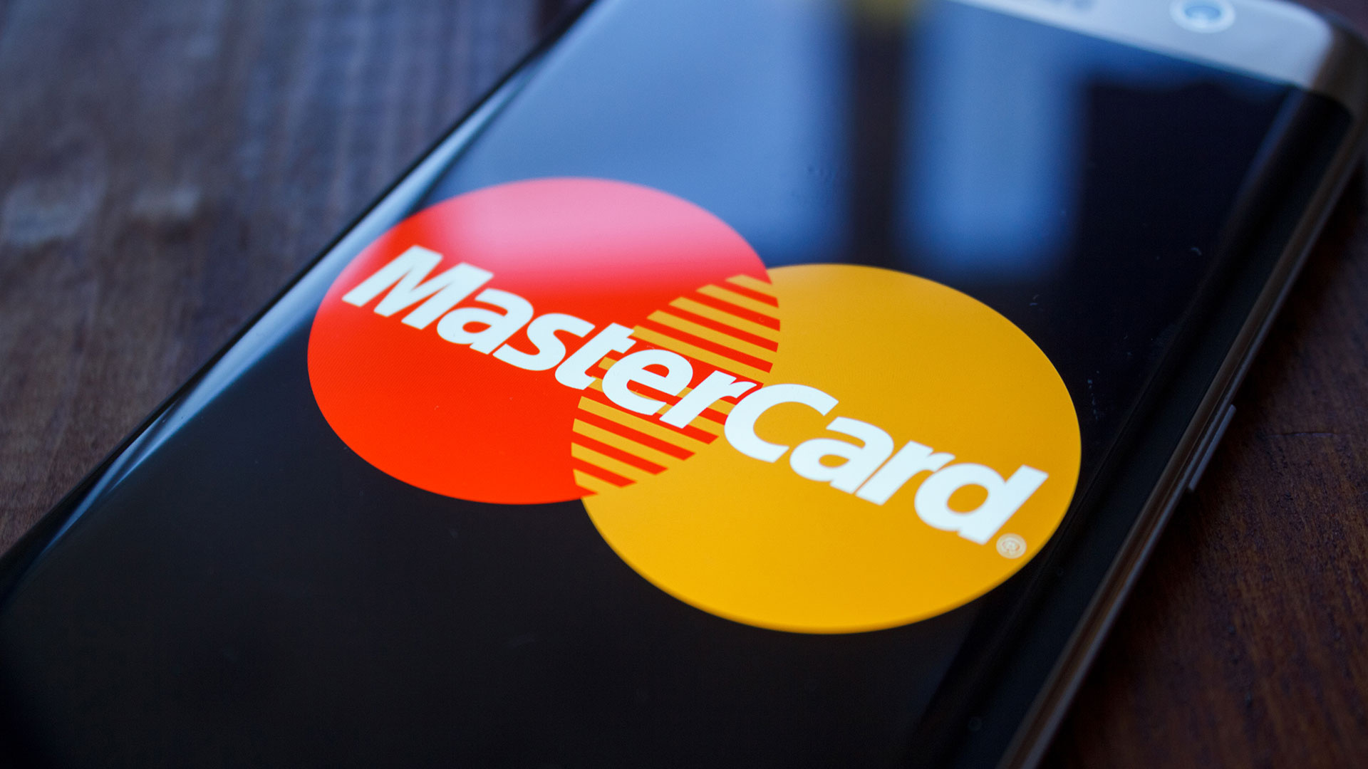 Mastercard: Gadget, Iconic brand mark, Money, Famous banking products. 1920x1080 Full HD Background.