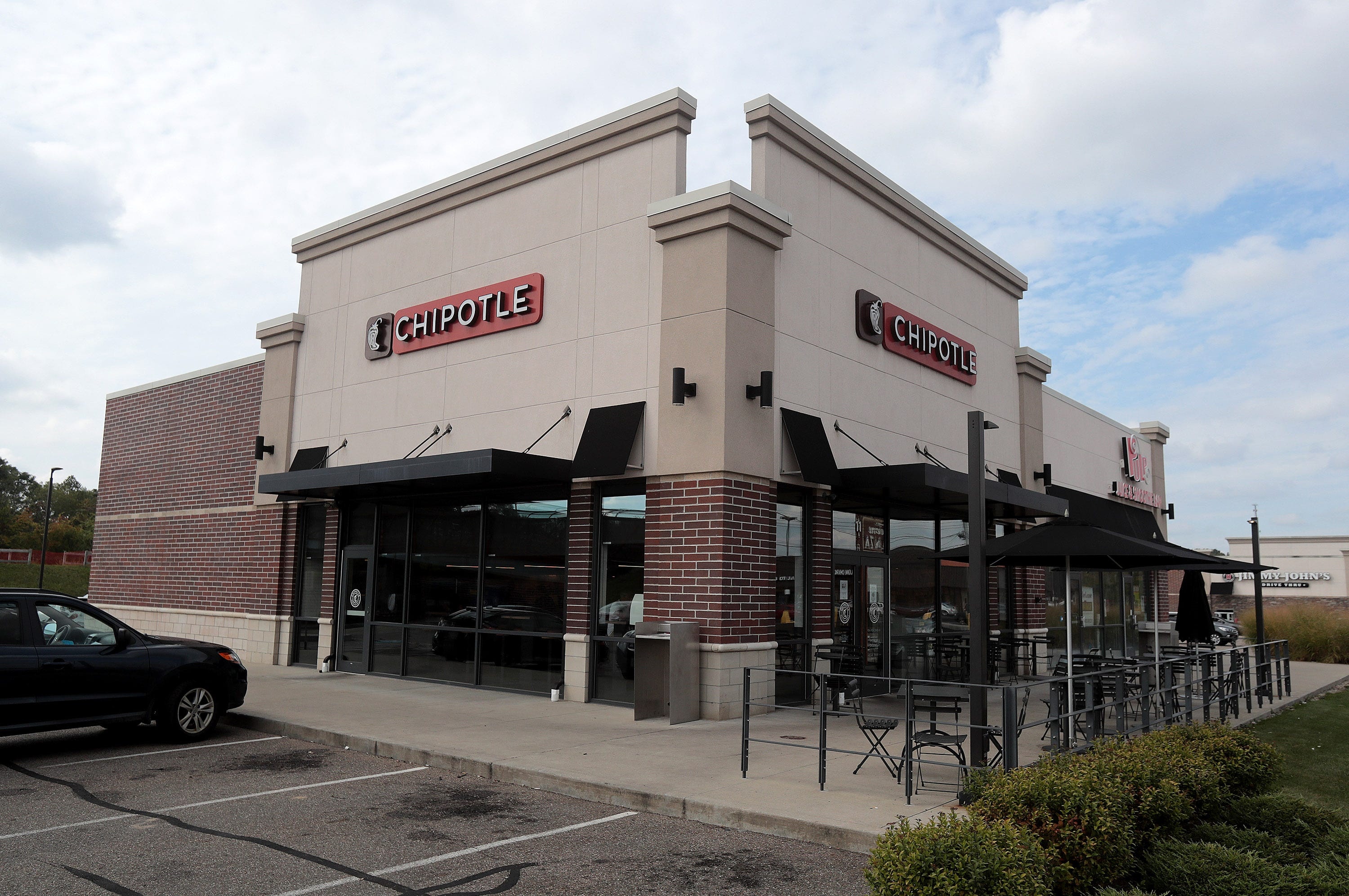 Chipotle: A fast-food chain that provides Mexican food, 13 Tommy Henrich Dr NW in Massillon. 3000x2000 HD Background.