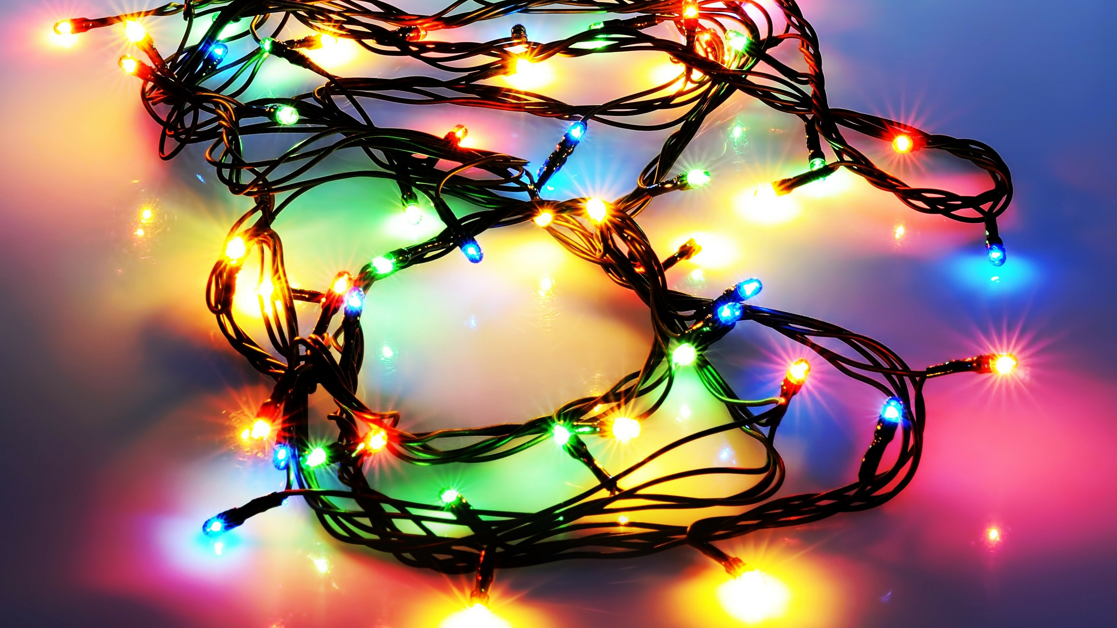 Fairy Lights: The custom goes back to when trees were decorated with candles. 3840x2160 4K Background.