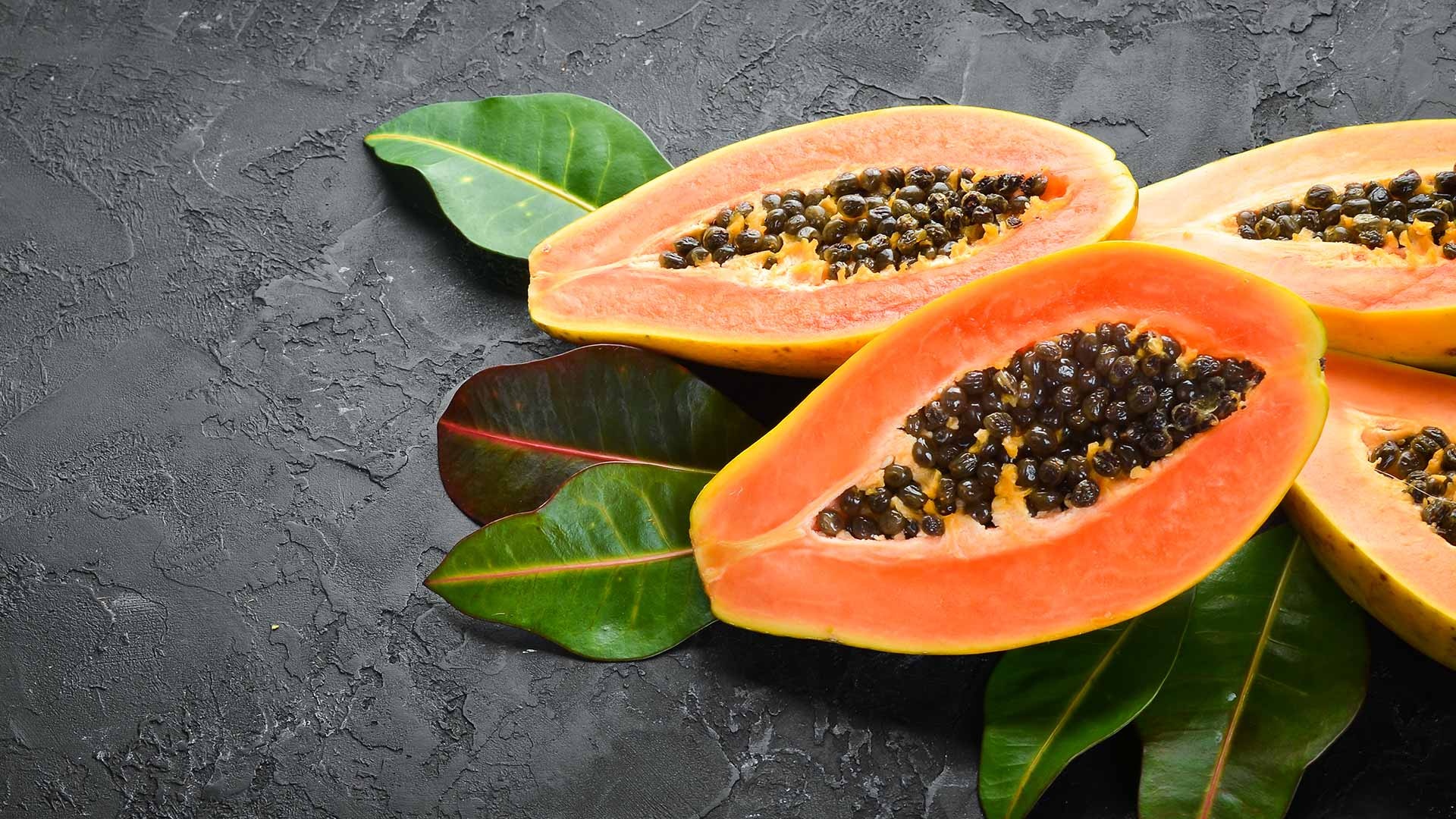 Papaya: A good source of vitamin C and vitamin A. 1920x1080 Full HD Background.