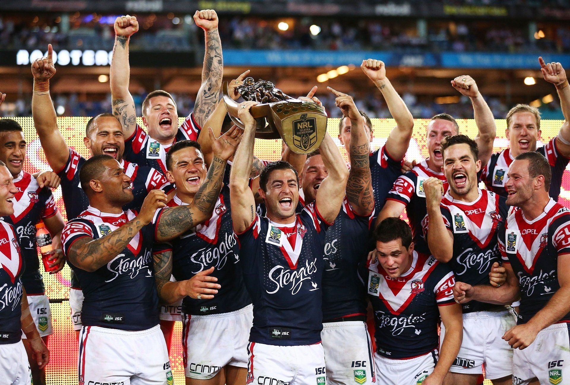 Rugby League: The Roosters celebrate with the premiership trophy after winning the NRL grand final in 2013. 1920x1300 HD Wallpaper.