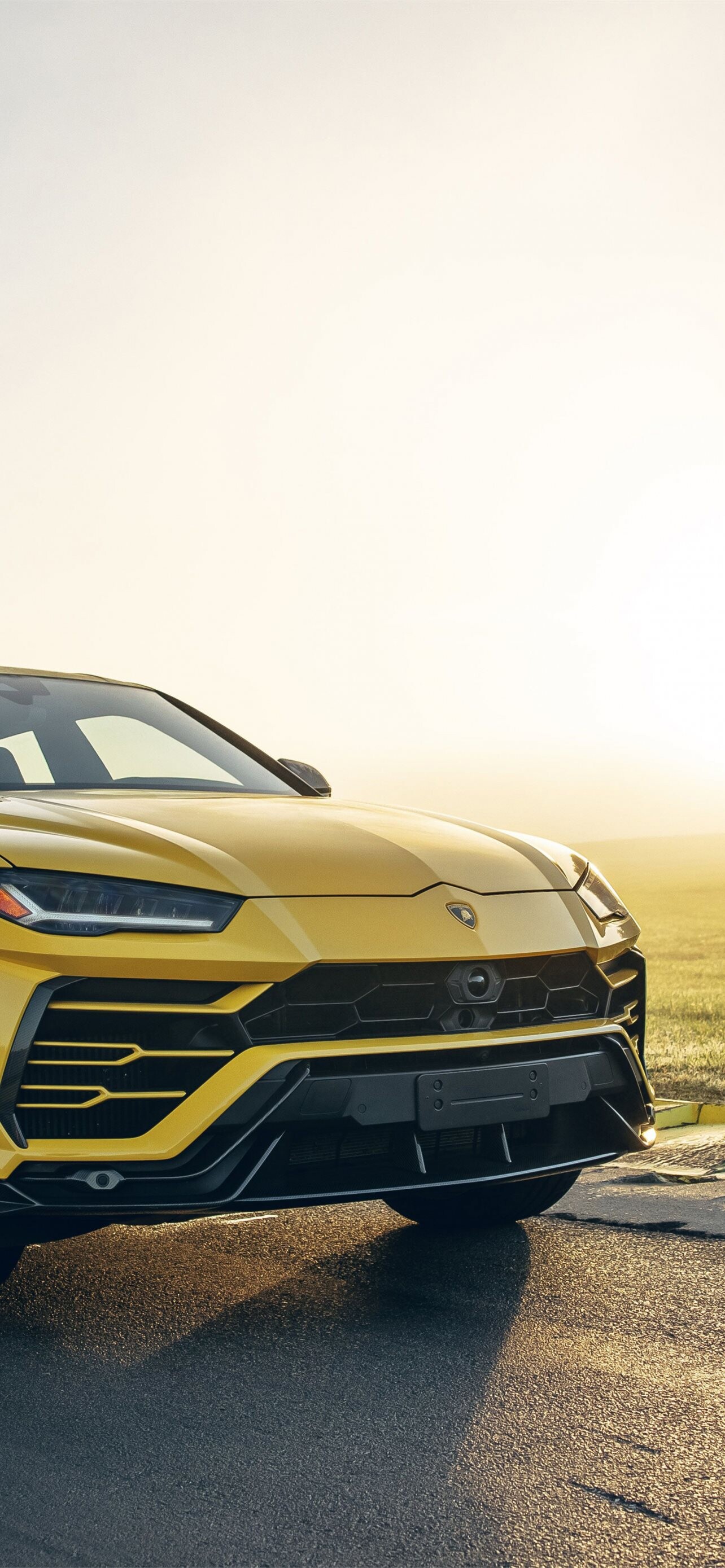 Gold Lamborghini: Urus, A high-performance luxury SUV, The company's best-selling model in the shortest time. 1290x2780 HD Wallpaper.