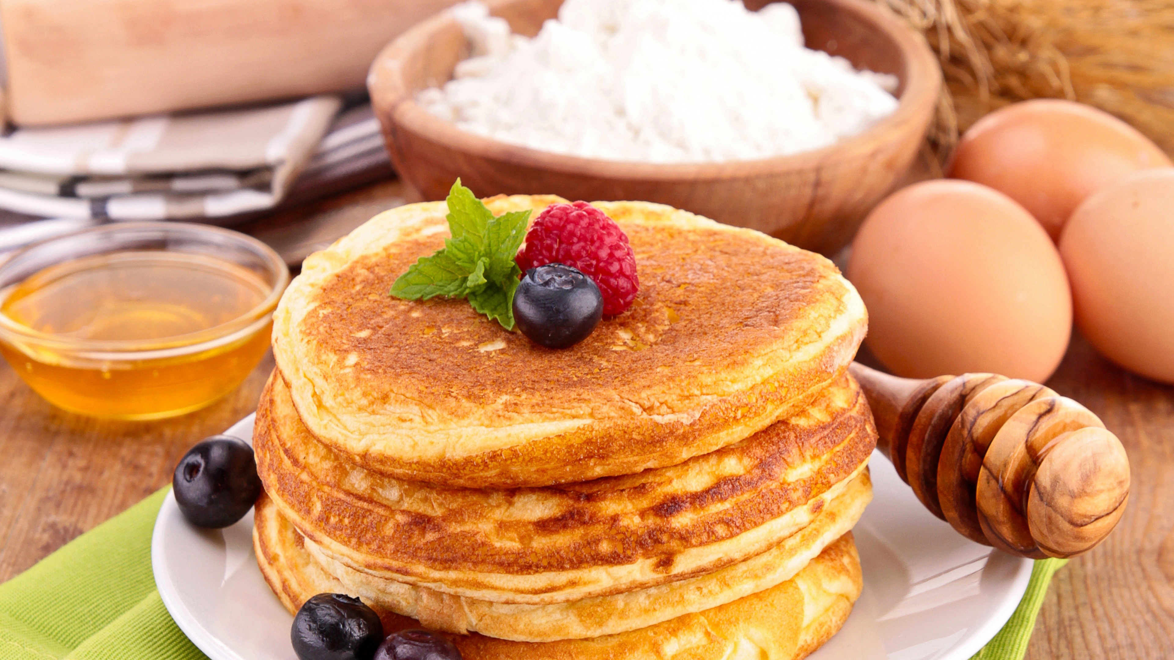 Pancake: Prepared from a starch-based batter that may contain eggs, milk, and butter. 3840x2160 4K Wallpaper.