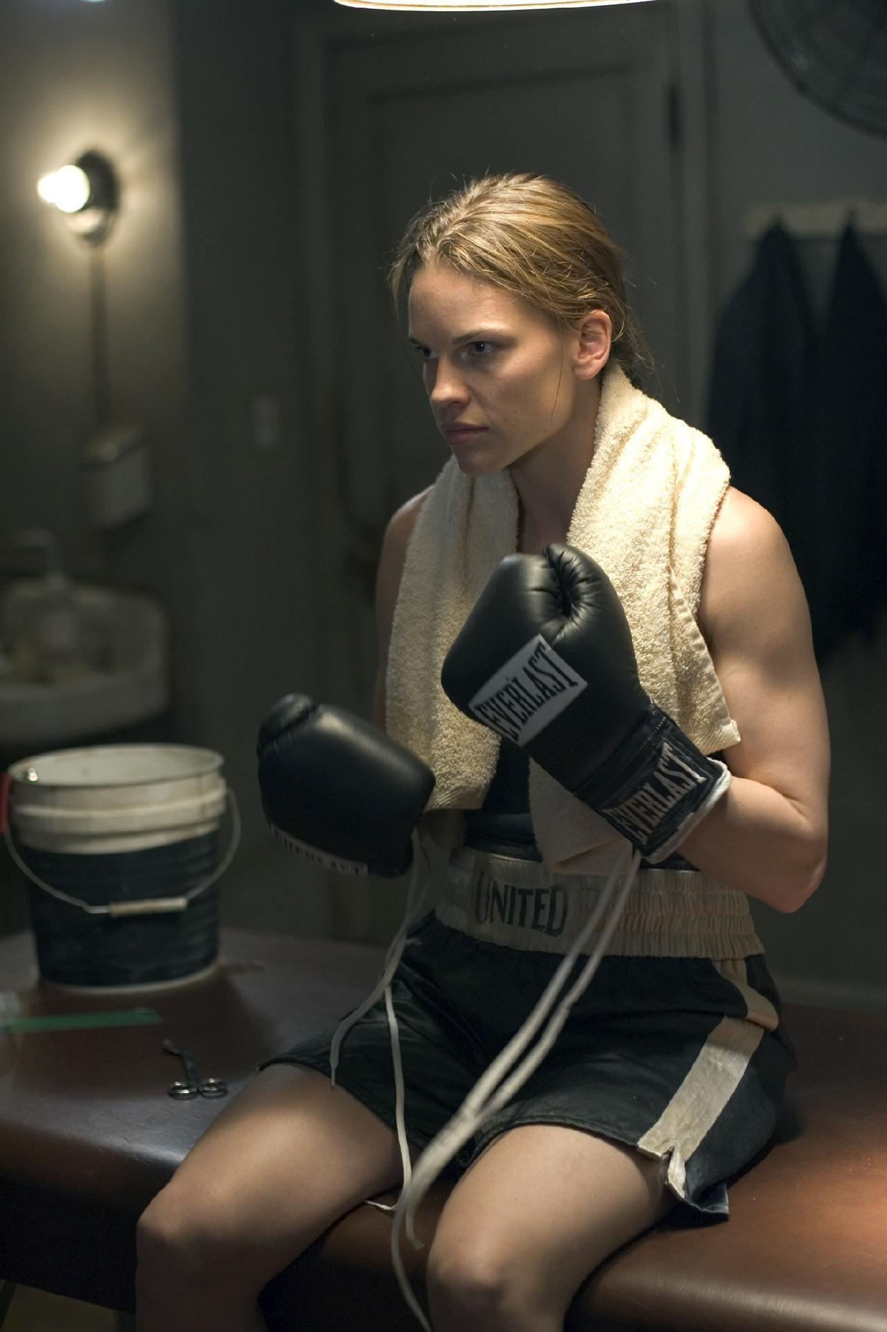 Million Dollar Baby: Mary Margaret "Maggie" Fitzgerald, a determined, aspiring boxer trained up by Frankie Dunn. 1280x1930 HD Background.