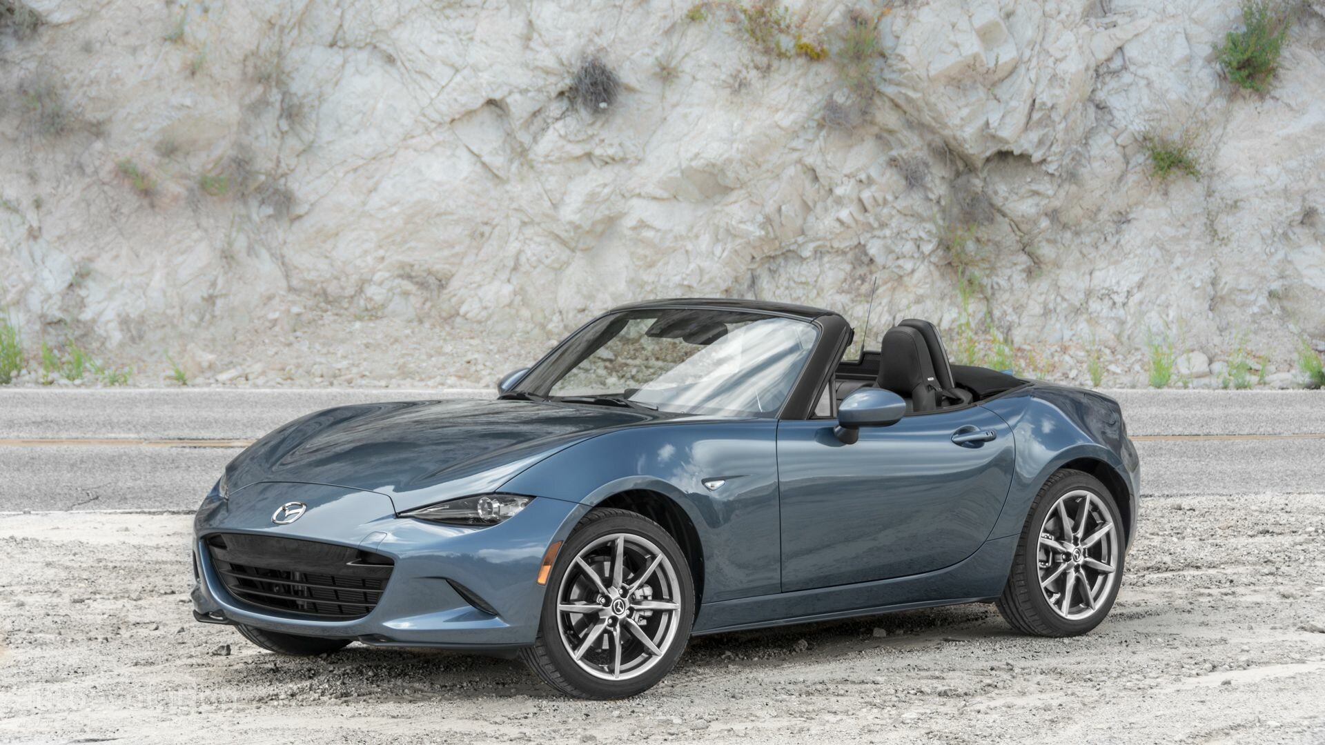 Mazda MX-5 Miata: The best-selling two-seat convertible sports car in history. 1920x1080 Full HD Background.