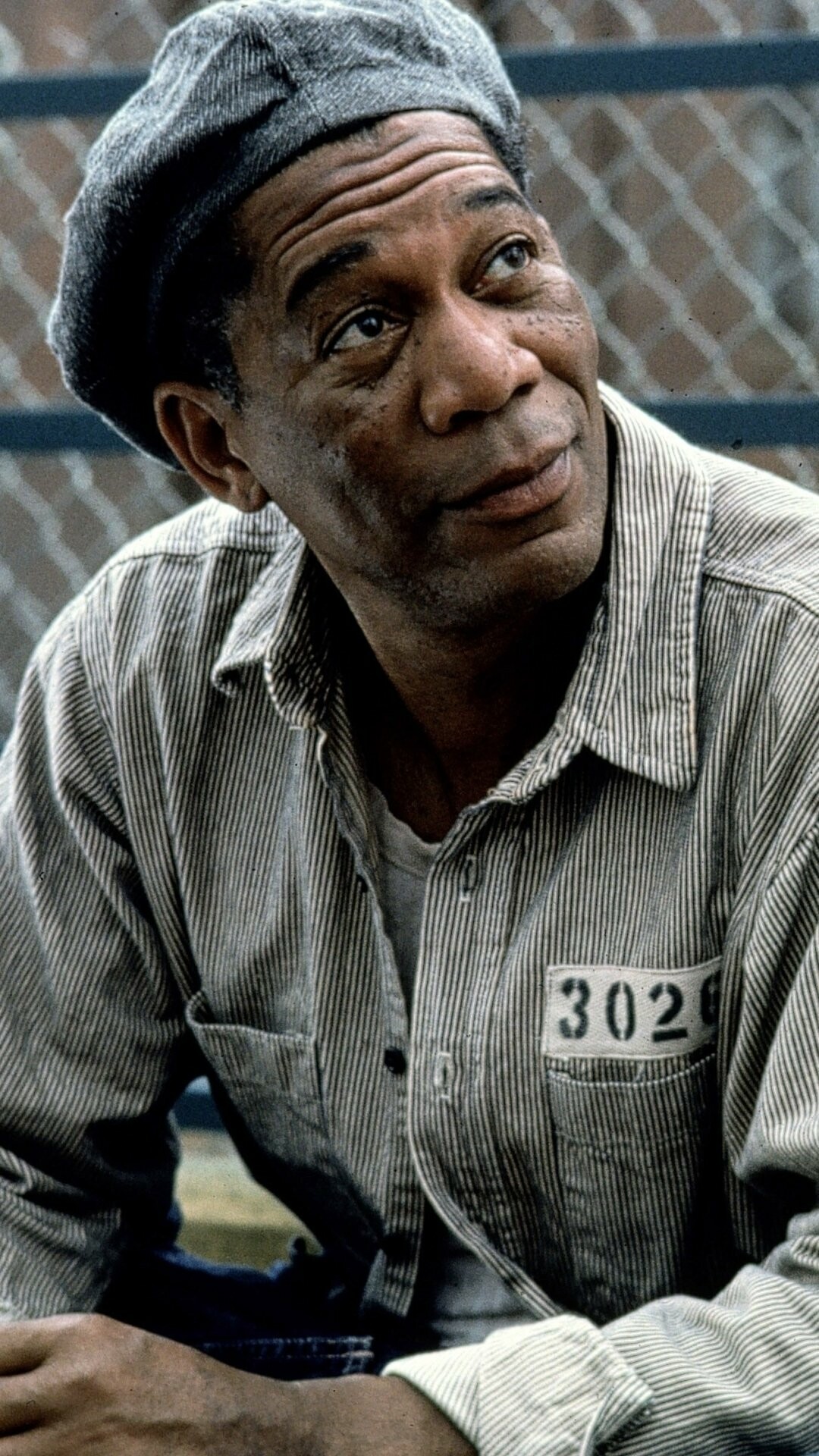 The Shawshank Redemption: Red, a longtime inmate at Shawshank who can smuggle anything in. 1080x1920 Full HD Wallpaper.