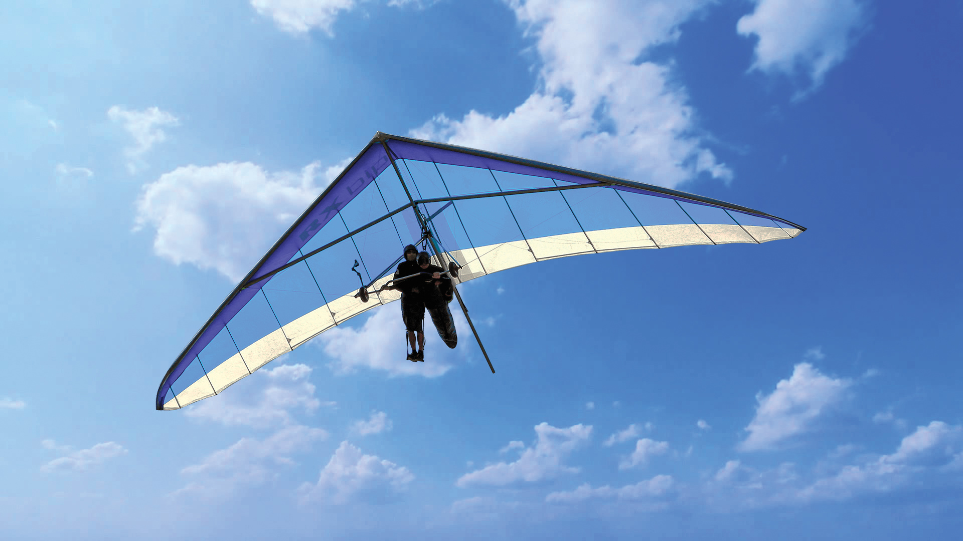Hang Gliding: An extended flight, Flying long distances, Tandem, Soaring pilots. 1920x1080 Full HD Background.