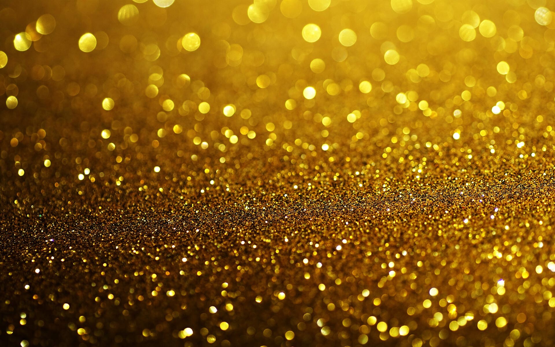 Gold Glitter: The decoration powder that is smaller than confetti, sparkles and sequins. 1920x1200 HD Background.