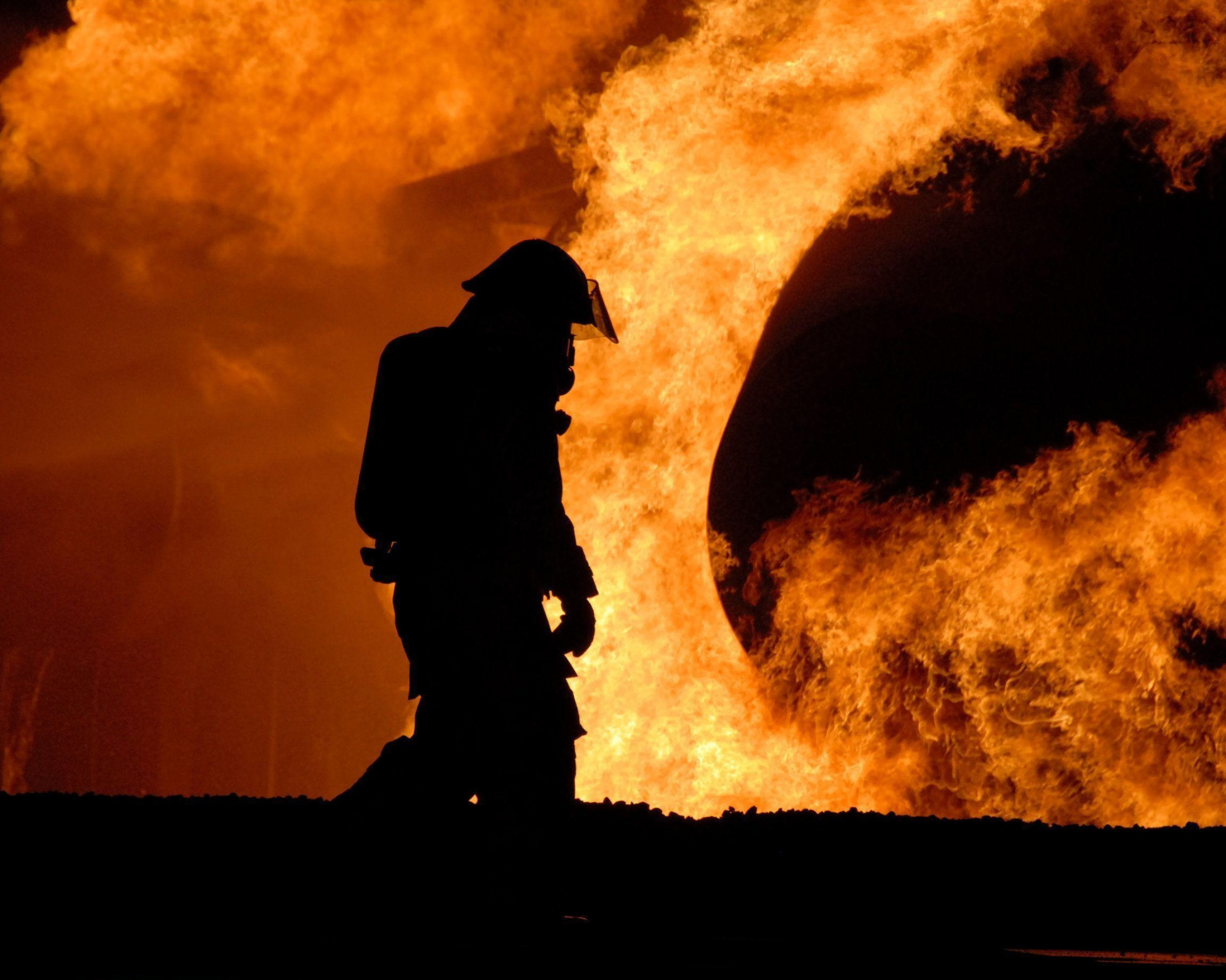 Fireman: A member of a fire department, Dangerous profession. 2560x2050 HD Background.