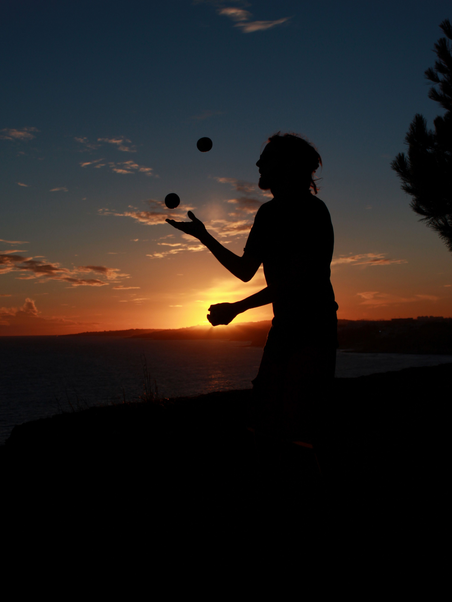 Juggling: Amateur juggler uses small balls to improve his cerebral connectivity performance, Useful recreational activity. 1540x2050 HD Background.
