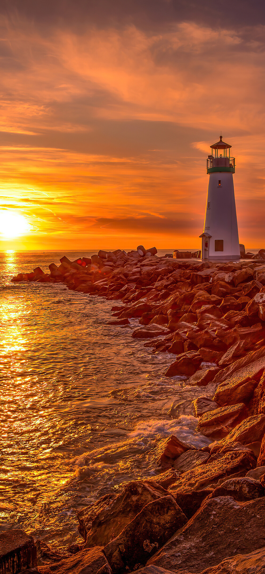 Sunrise: Break of day, Lighthouse, Spectacular maritime scenery. 1130x2440 HD Background.