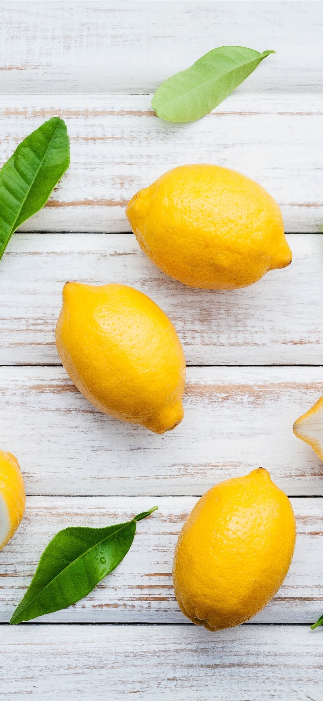 Lemon: Used to enhance poultry, fish, and vegetable dishes worldwide. 1130x2440 HD Wallpaper.