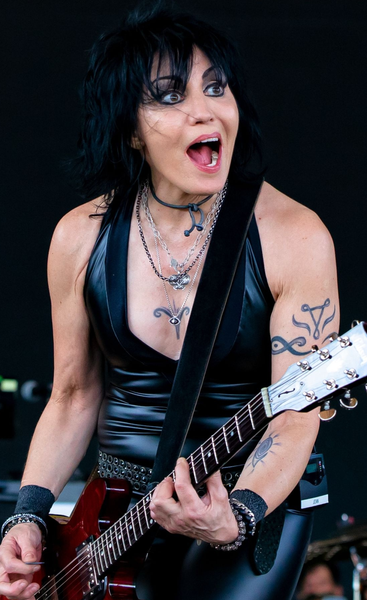 Joan Jett, Powerful stage presence, Rock and roll attitude, Music icon, 1230x2000 HD Handy