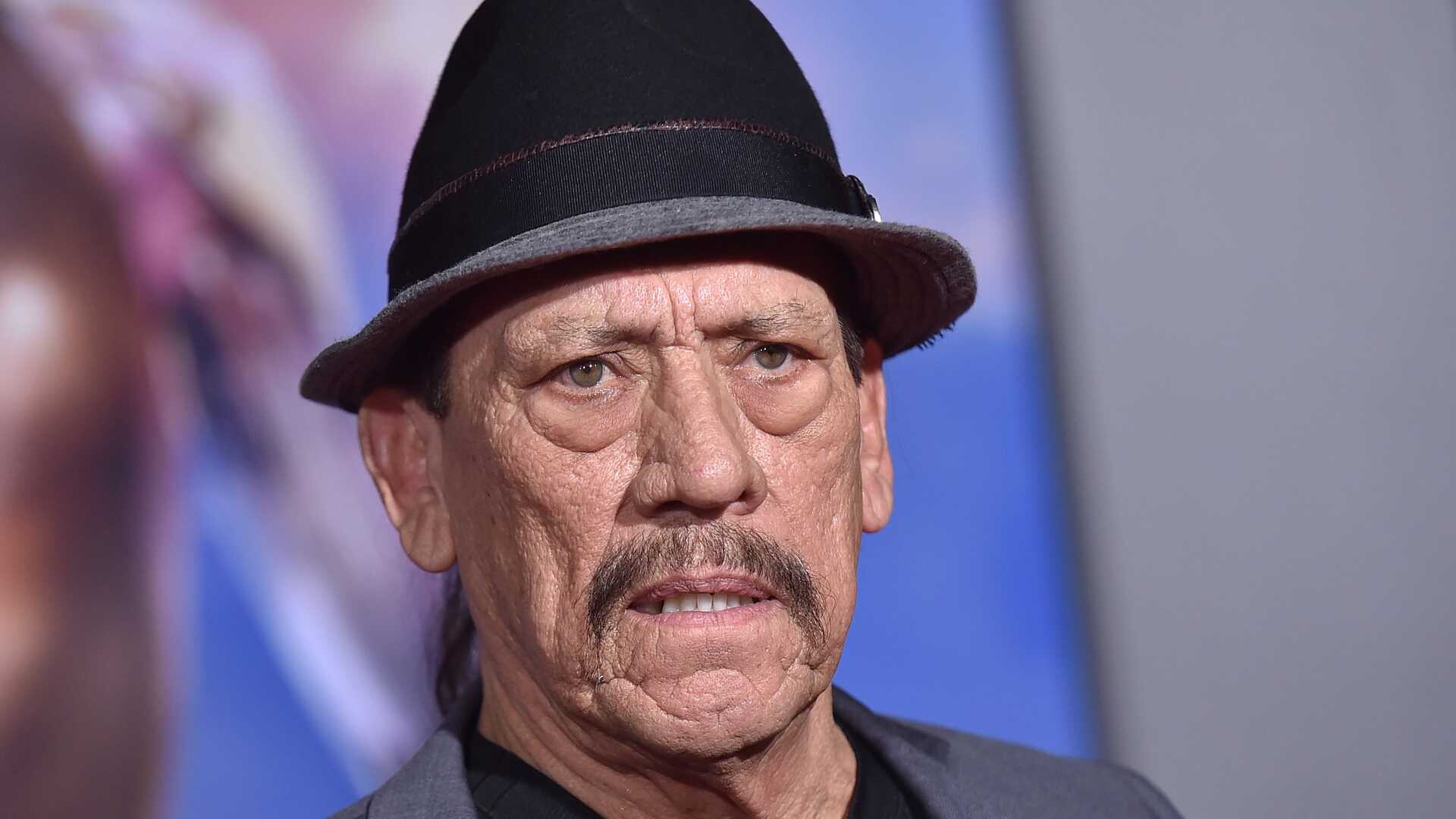 Danny Trejo: A distinctive appearance, Heavily lined face, A potential lead actor in action films. 1920x1080 Full HD Background.