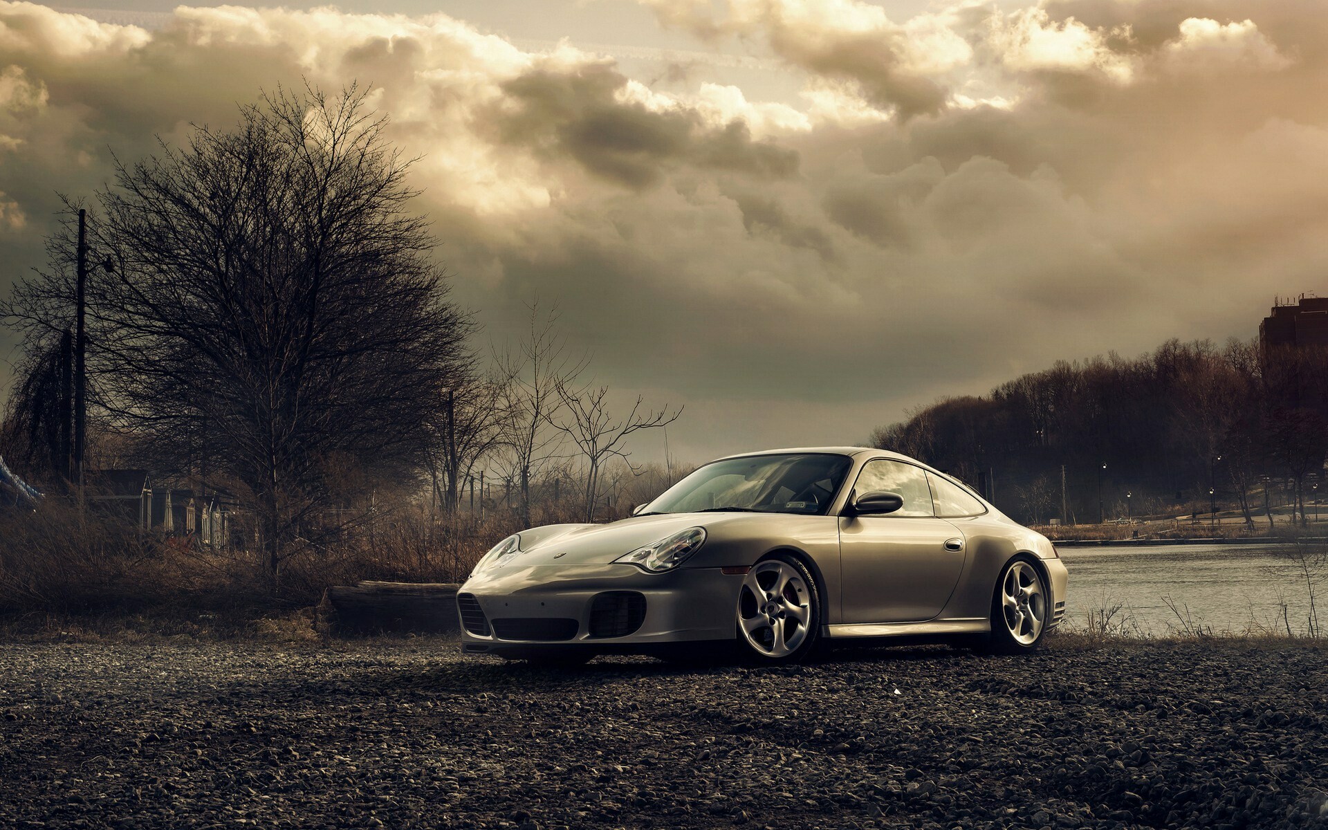 Porsche: The car has been continuously enhanced through the years but the basic concept has remained unchanged, 911. 1920x1200 HD Background.