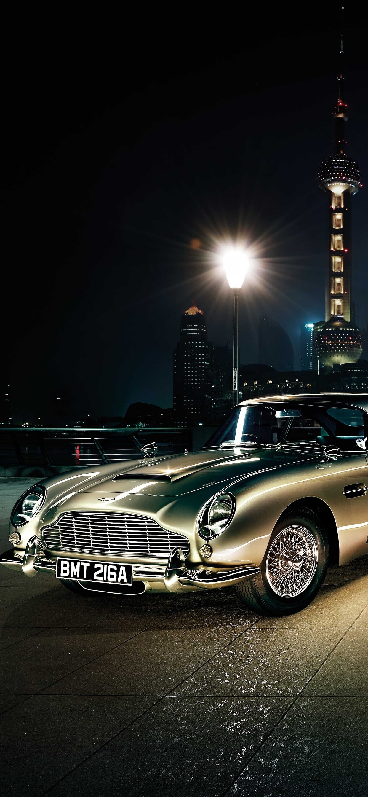Aston Martin: A luxury brand, Emphasis on high-thrill performance and discreet British elegance. 1250x2690 HD Background.