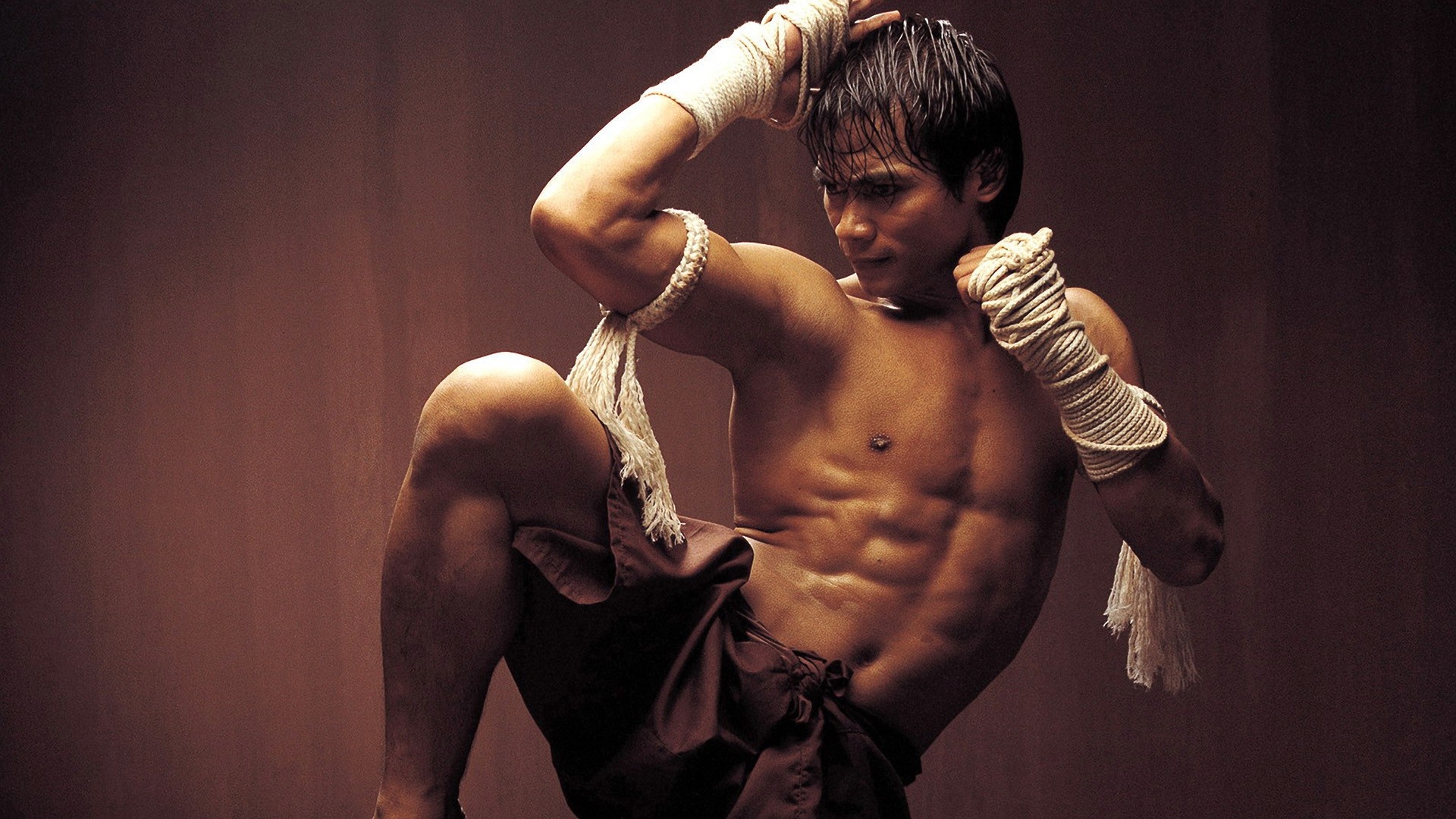 Muay Thai: Tony Jaa, Ong-Bak: Muay Thai Warrior, A film by EuropaCorp production company. 1920x1080 Full HD Background.