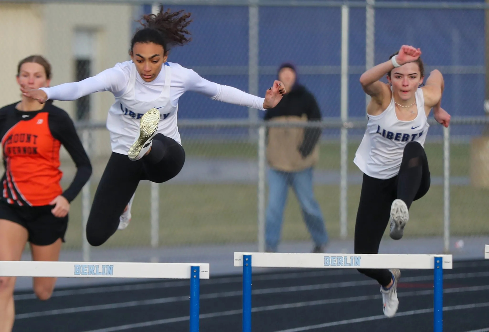 Hurdling: Track and field hurdles, Sprint race with hurdles, Short distance running, Olentangy Liberty High School. 2050x1390 HD Background.