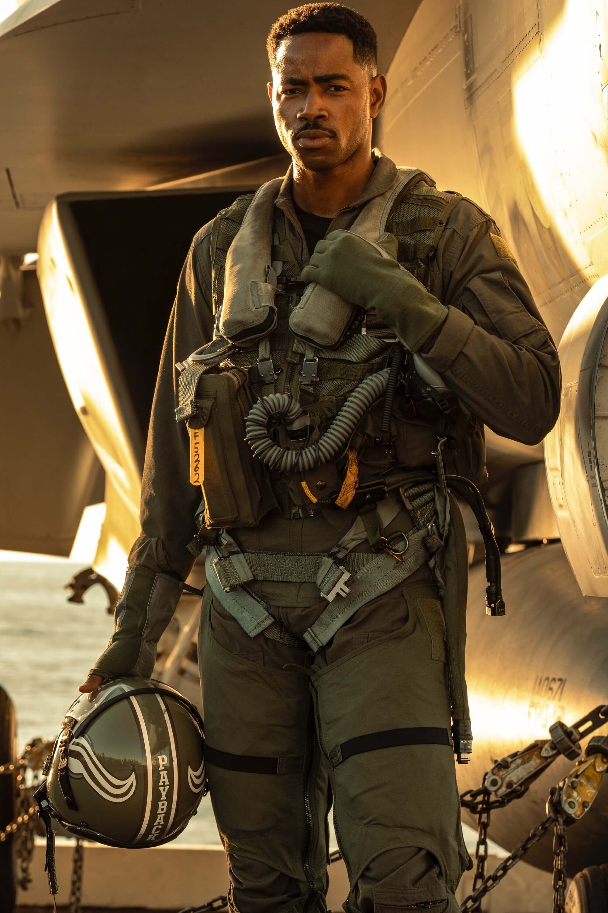 Top Gun: Maverick: Jay Ellis, LT Reuben “Payback” Fitch, An F/A-18F pilot and mission candidate. 2000x3000 HD Background.