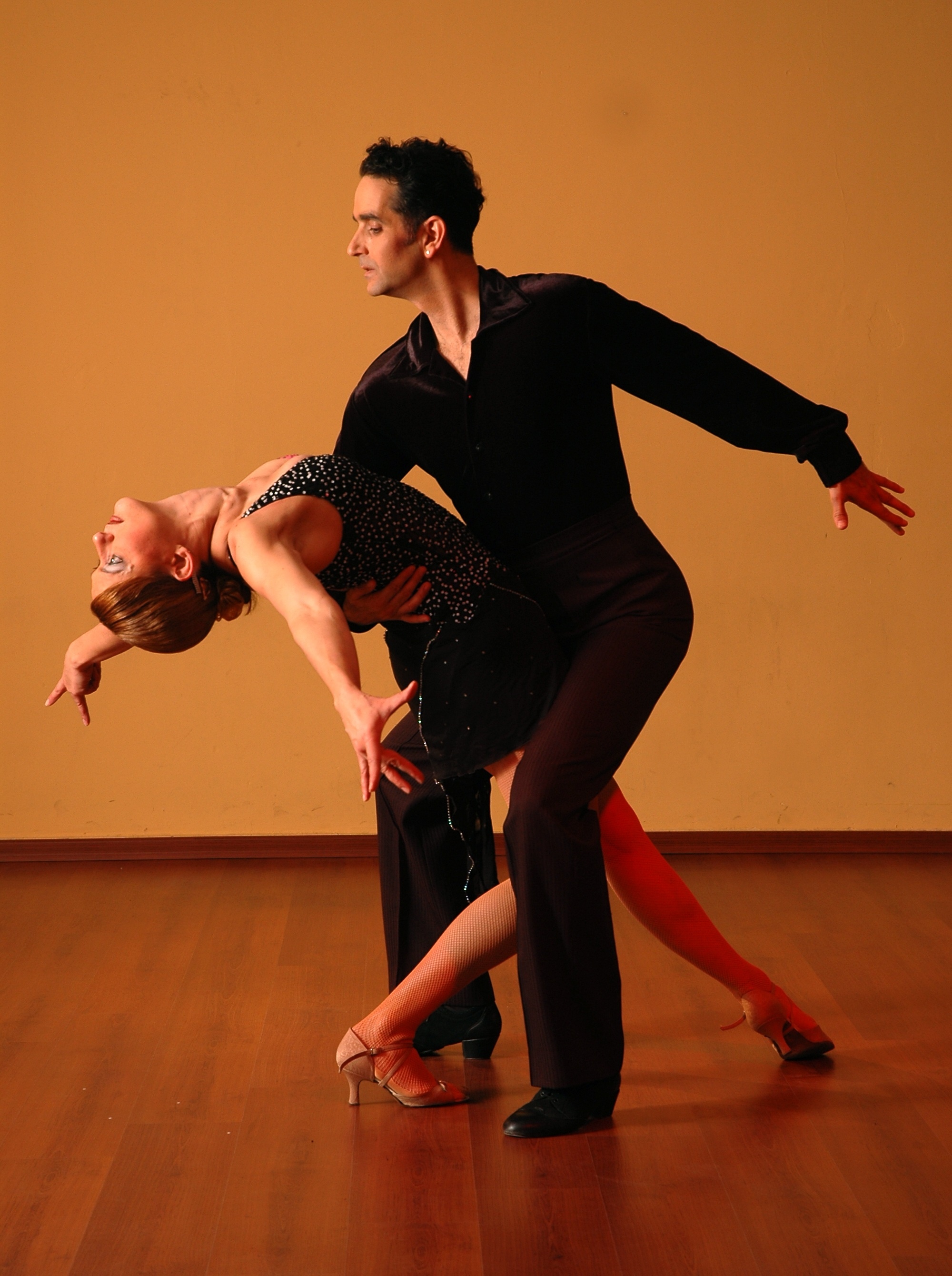 Merengue Dance: Man and Woman dancing, A style of Dominican music and dance. 2000x2680 HD Wallpaper.